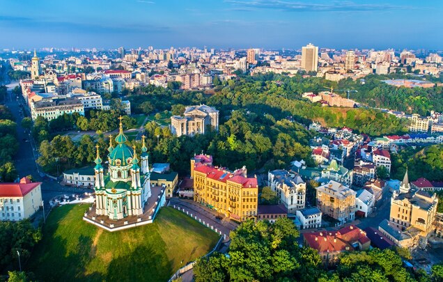 Aerial view of Saint Andrews church and Andriyivskyy Descent, cityscape of Podil. Kiev, the capital of Ukraine.