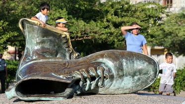a sculpture of a pair of boots