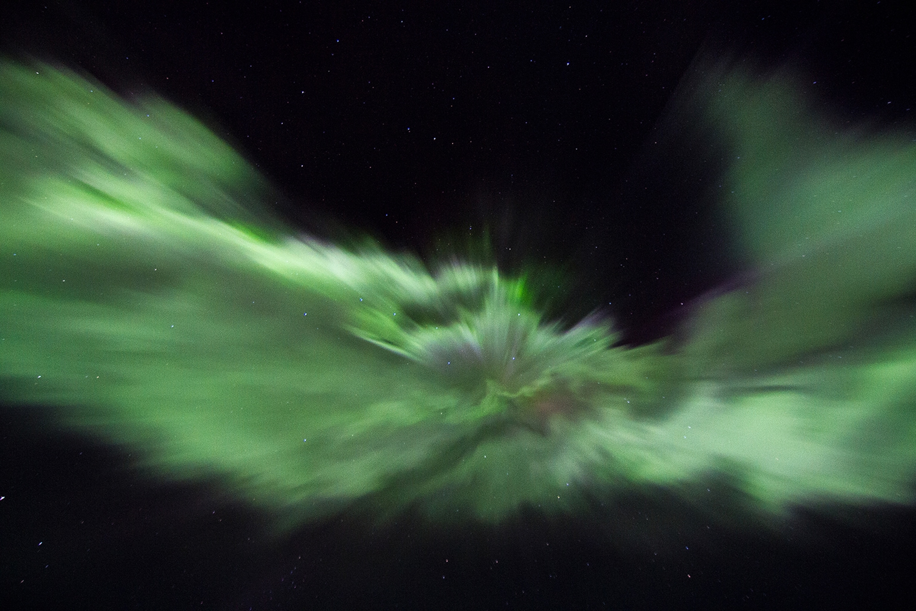a strong, green aurora borealis over Fairbanks, Alaska