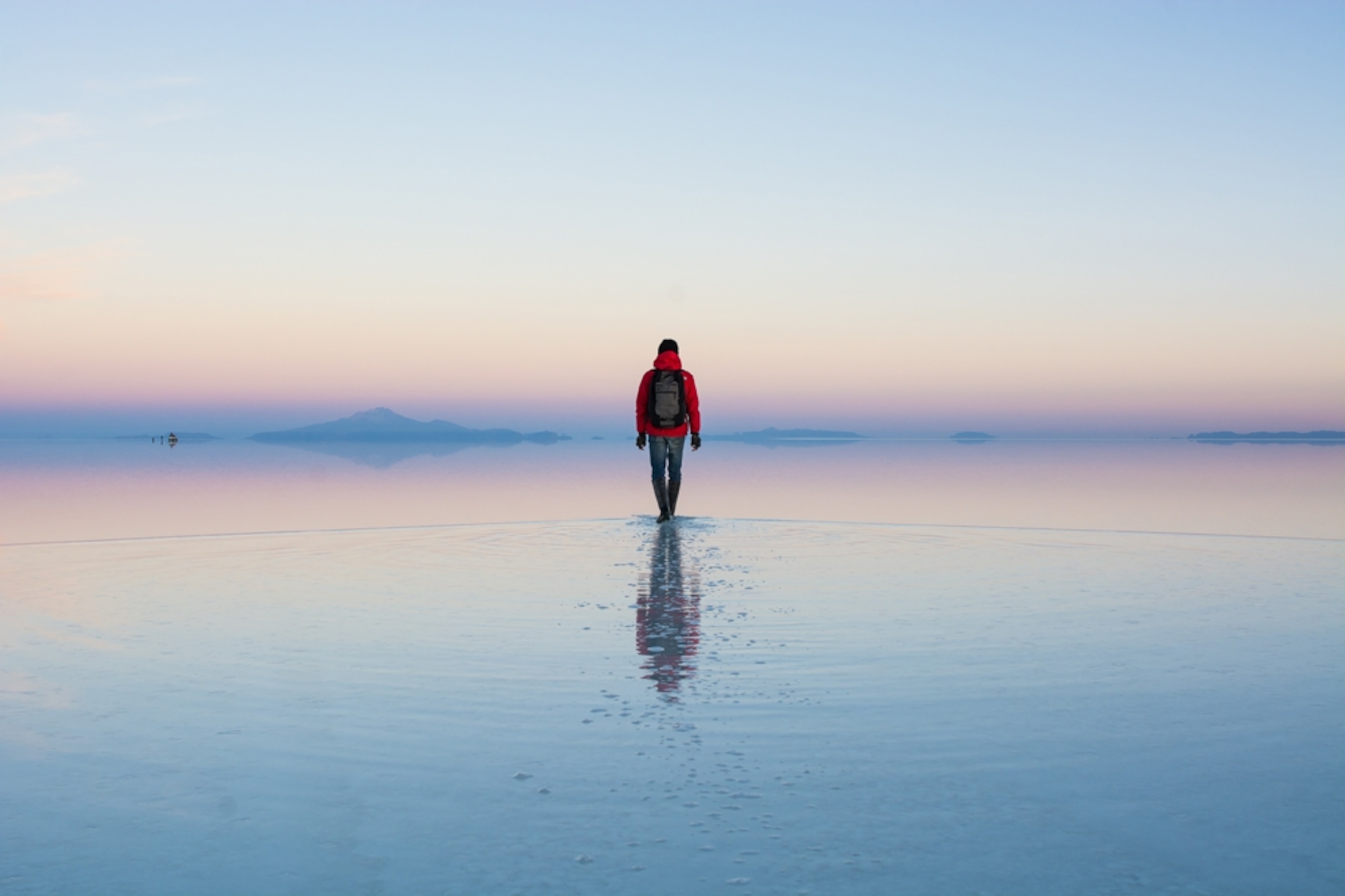 person walking in salt flat Bolivia