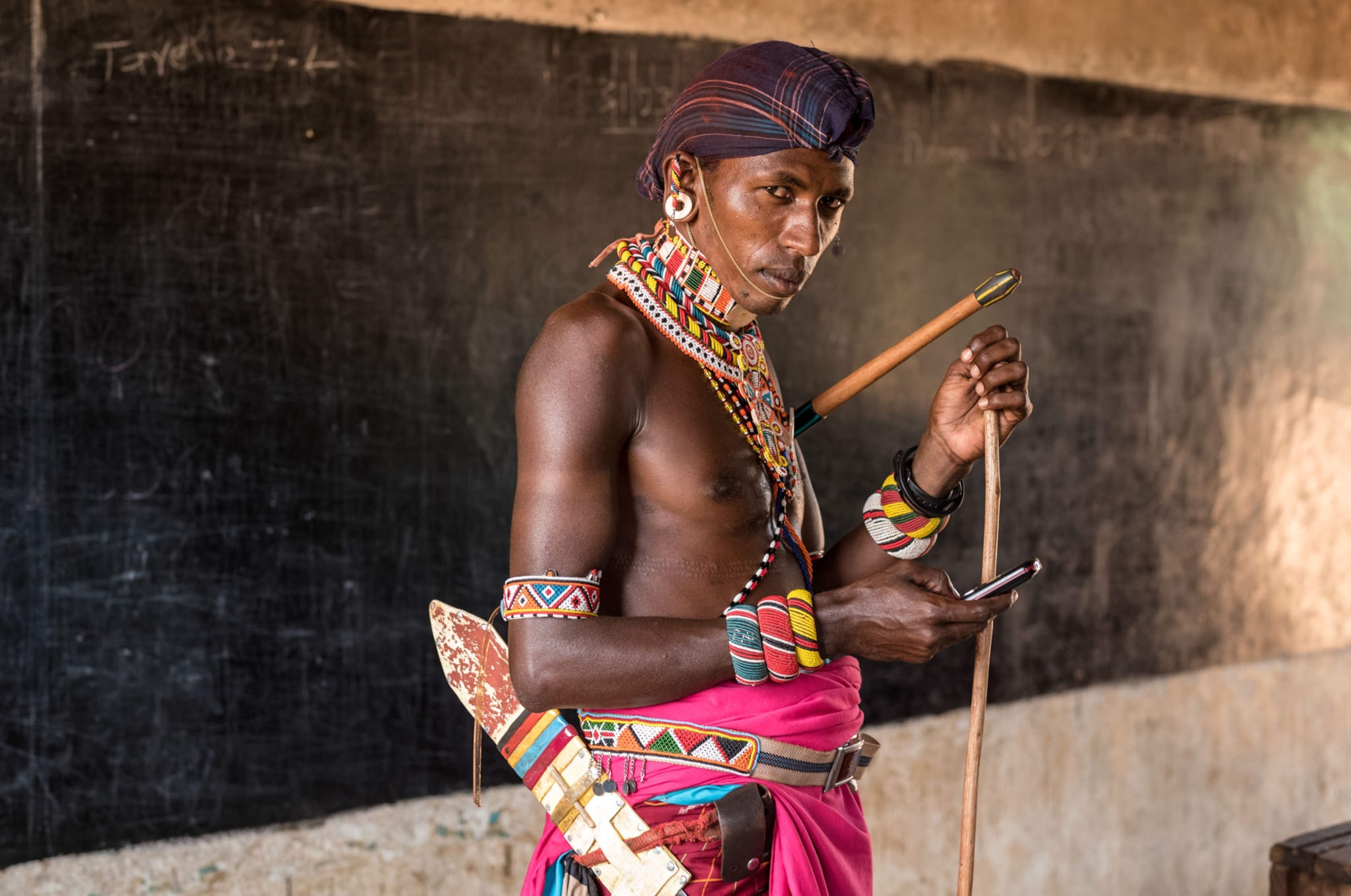 samburu warrior with his cellphone