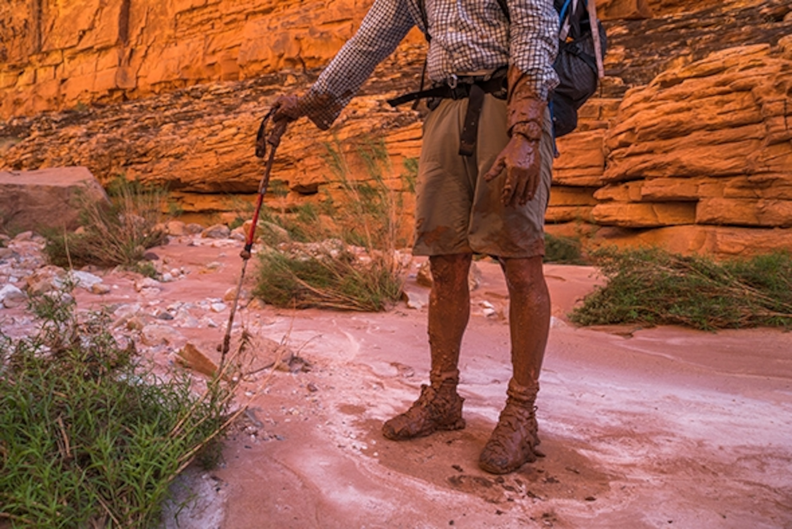 Writer Kevin Fedarko after falling into a bog in a slot canyon, Marble Canyon. Photograph by Pete McBride