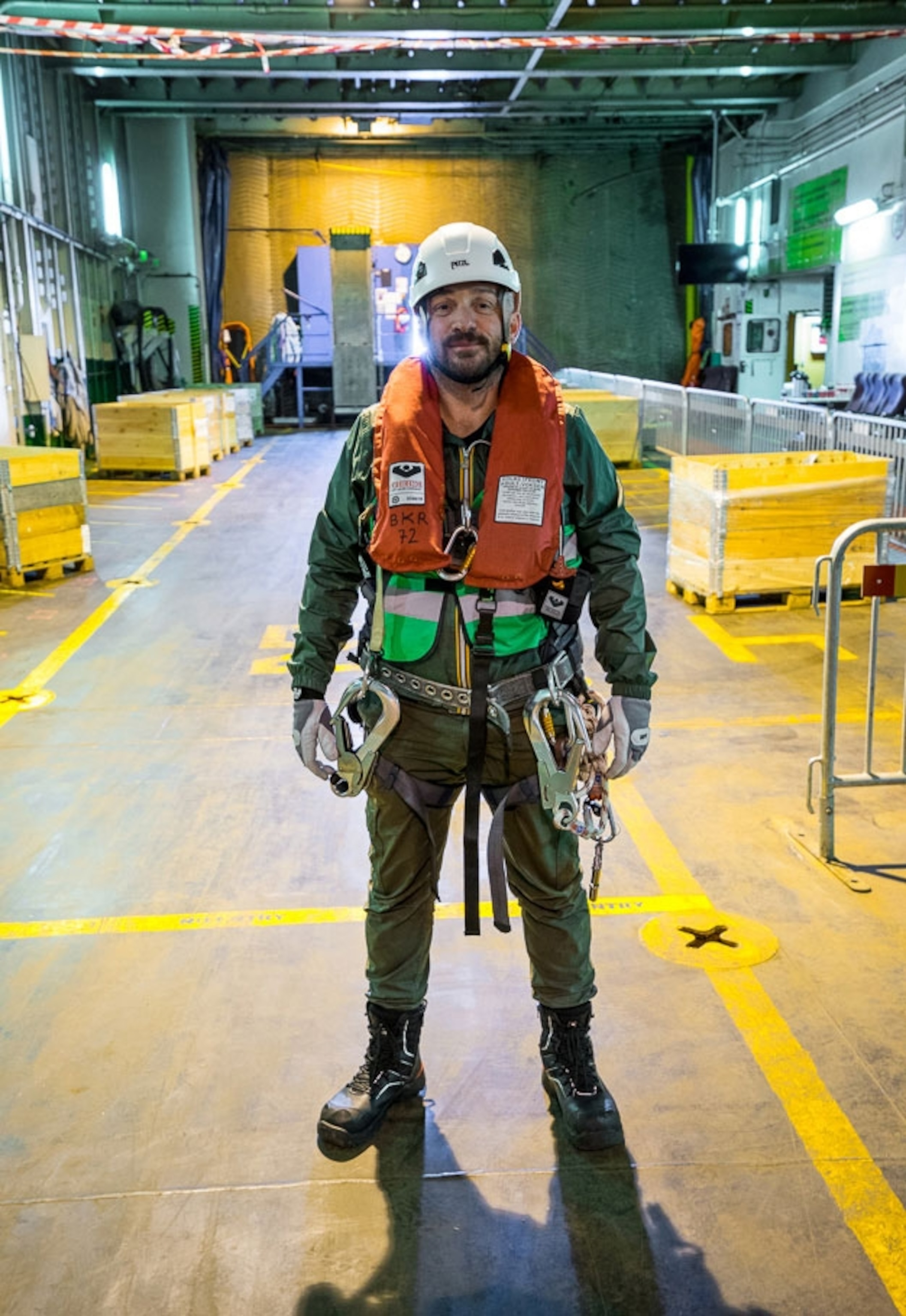 photographer Luca Locatelli all geared up to photograph wind turbines in the North Sea