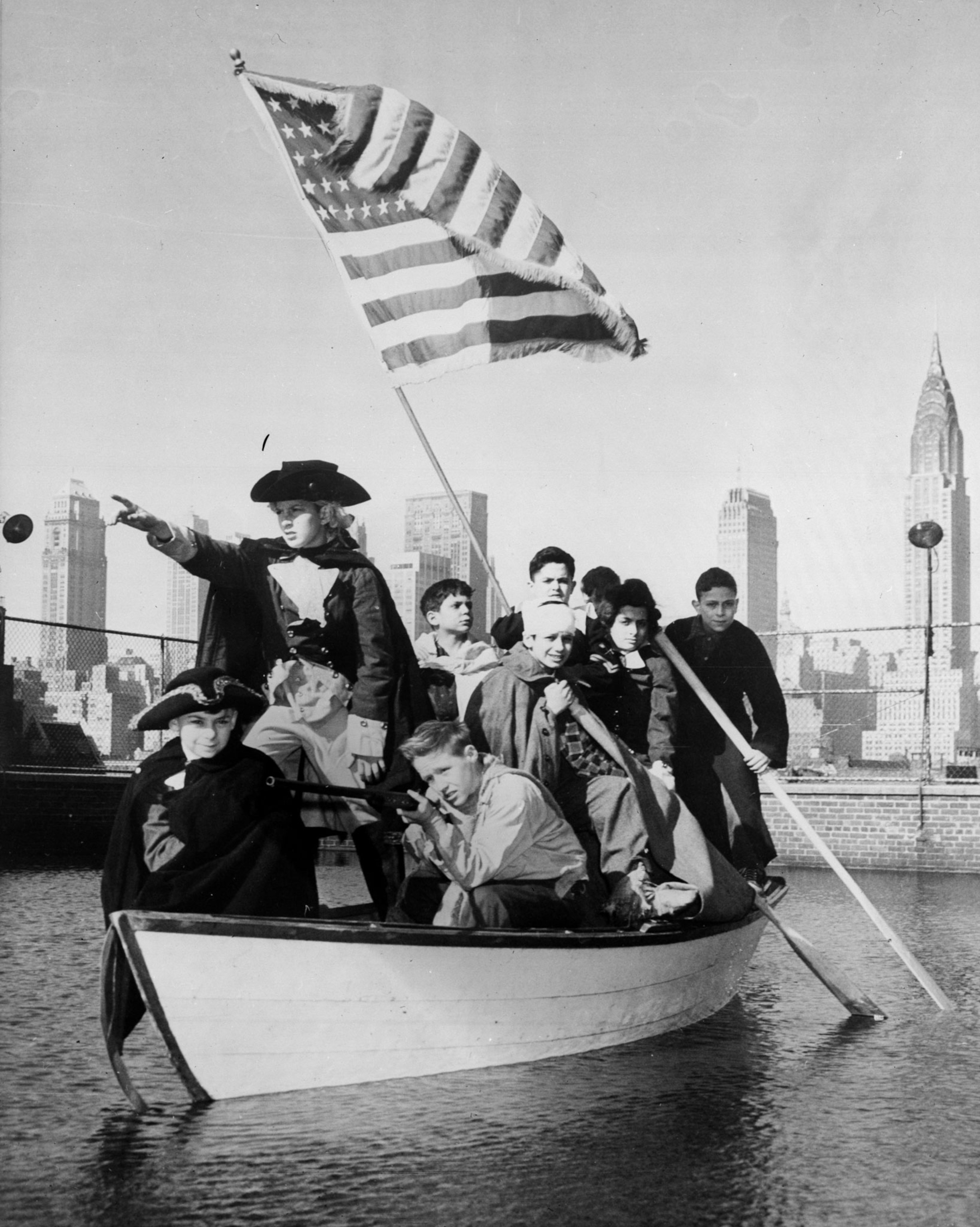 boys re enacting the crossing of the Delaware on the roof of their clubhouse