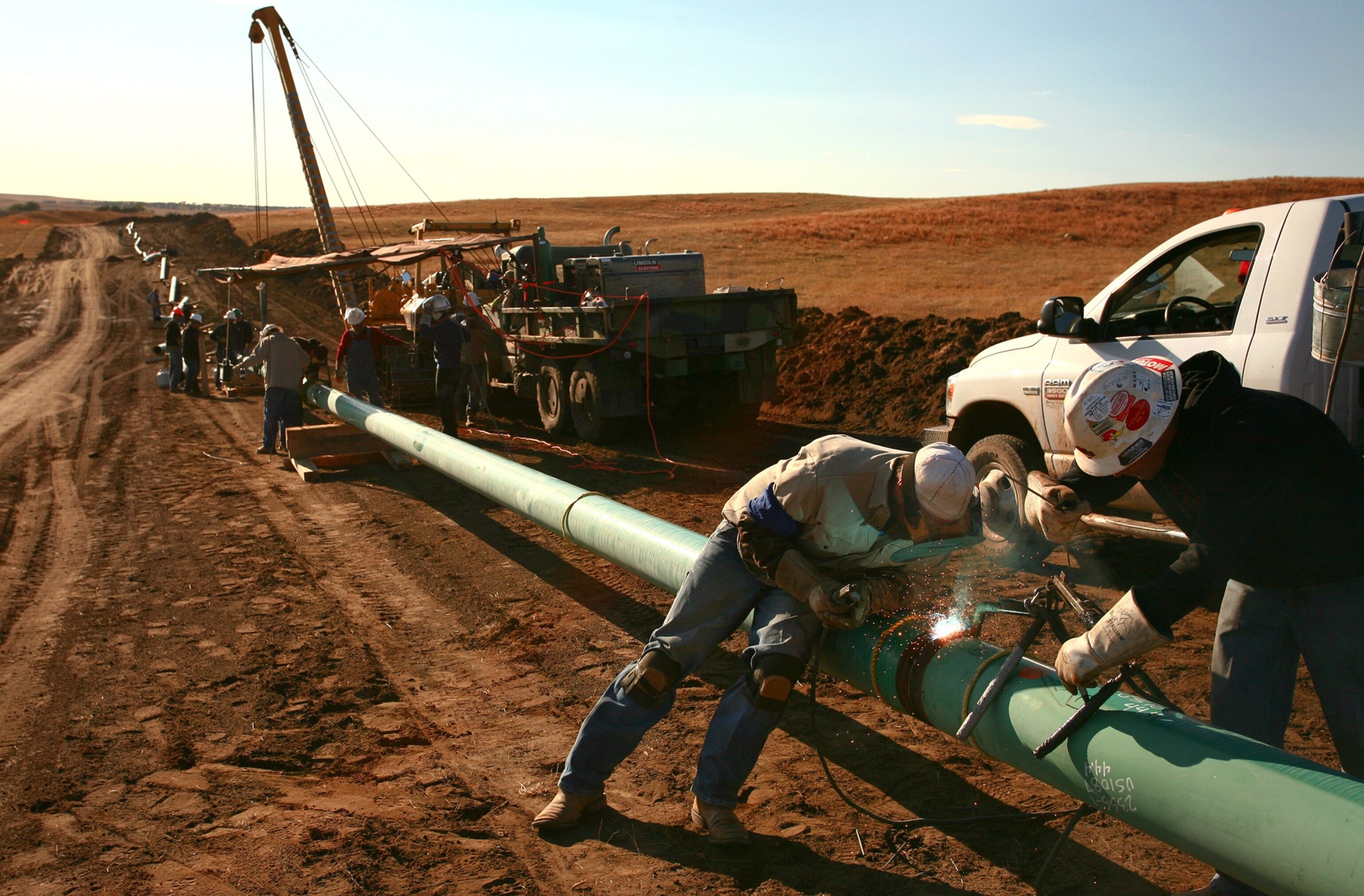 workers constructing a gas pipeline near Watford City, North Dakota