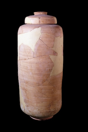 A restored pottery jar and lid of the type used to contain the Dead Sea Scrolls from Cave 1, where the first scrolls were found.