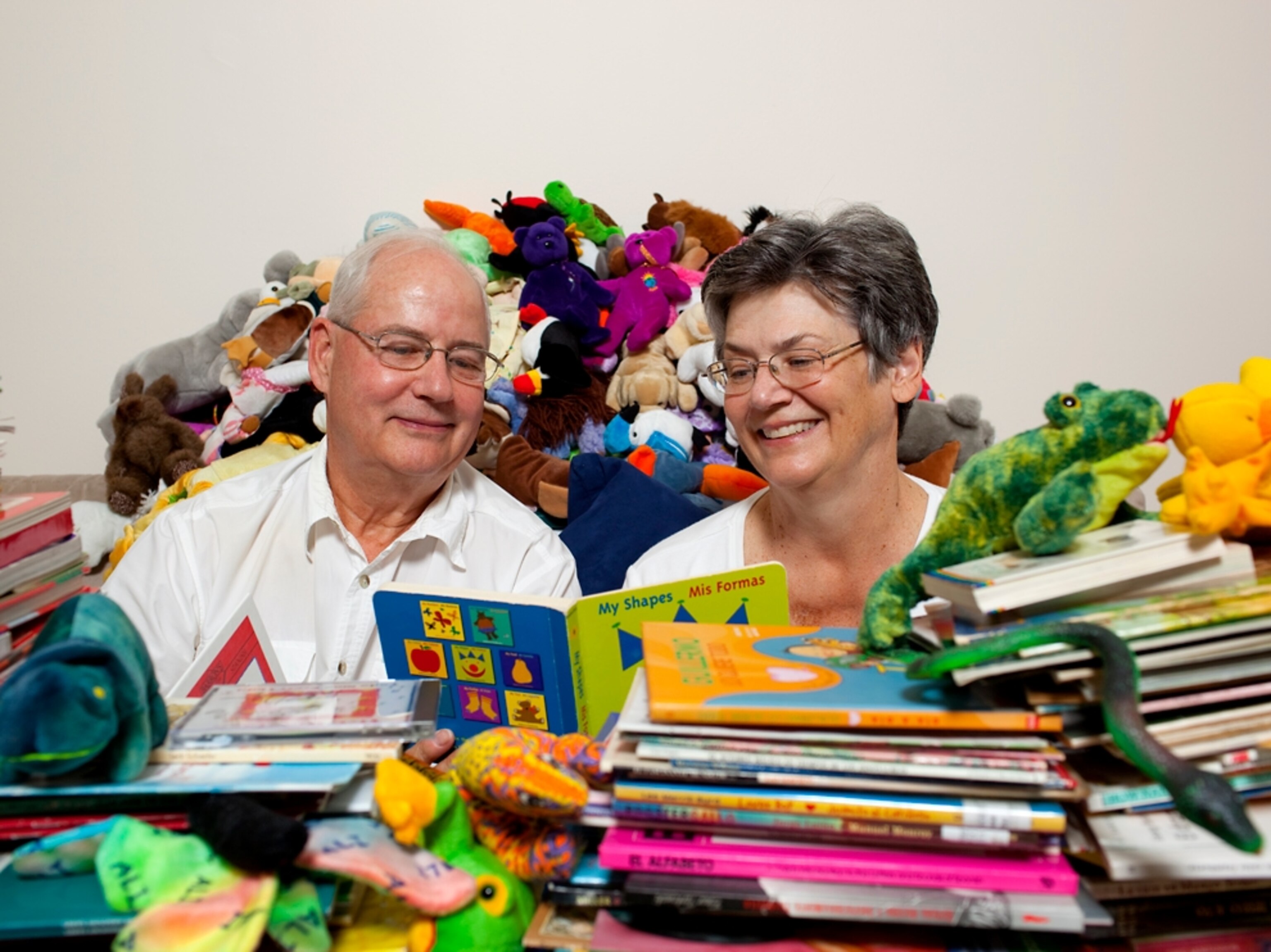 Mary Jean Jecklin and Kelley Rea with books and toys