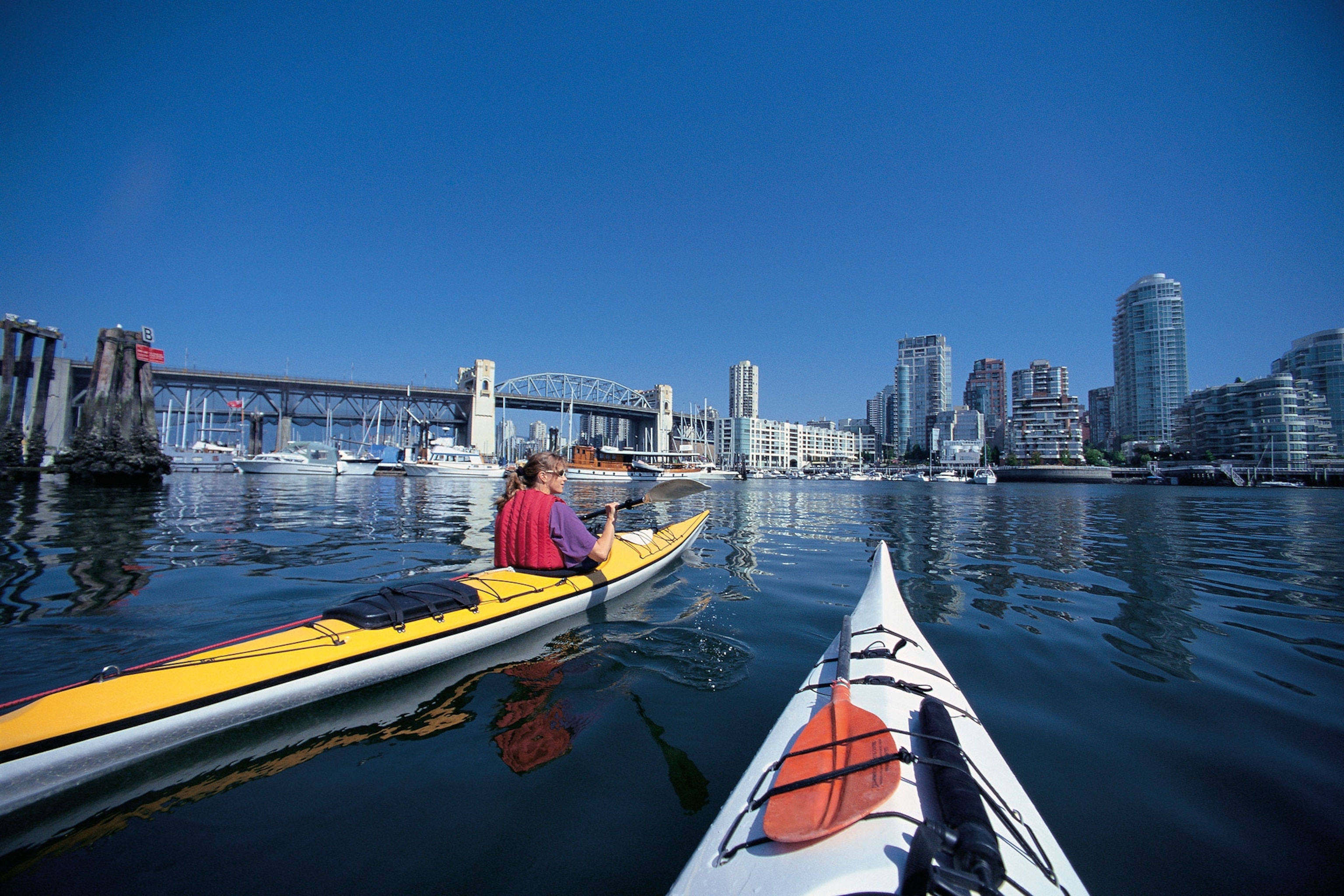 kayakers in False Creek, Vancouver, British Columbia