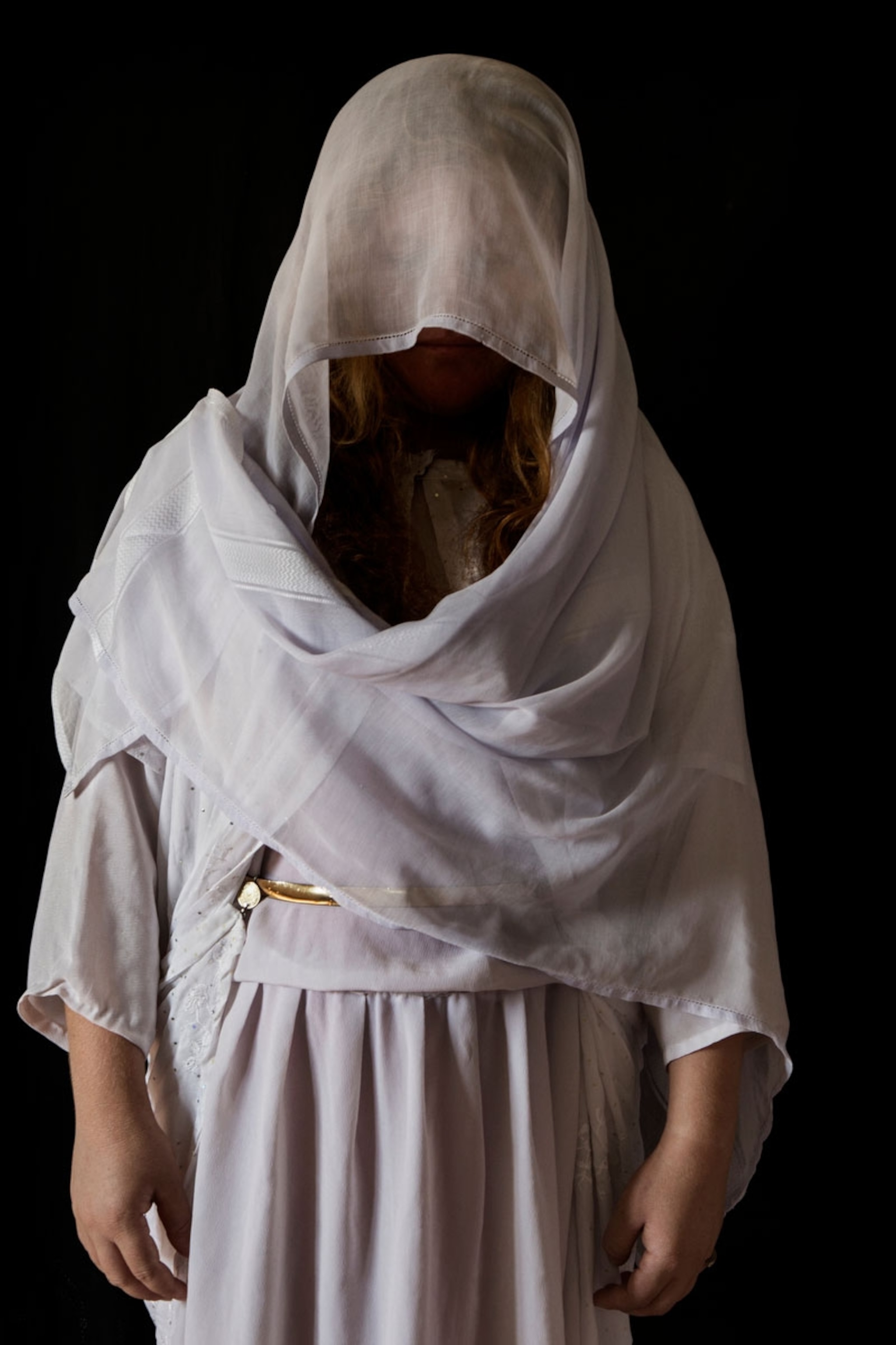 a Yazidi woman who was held as a slave by ISIS