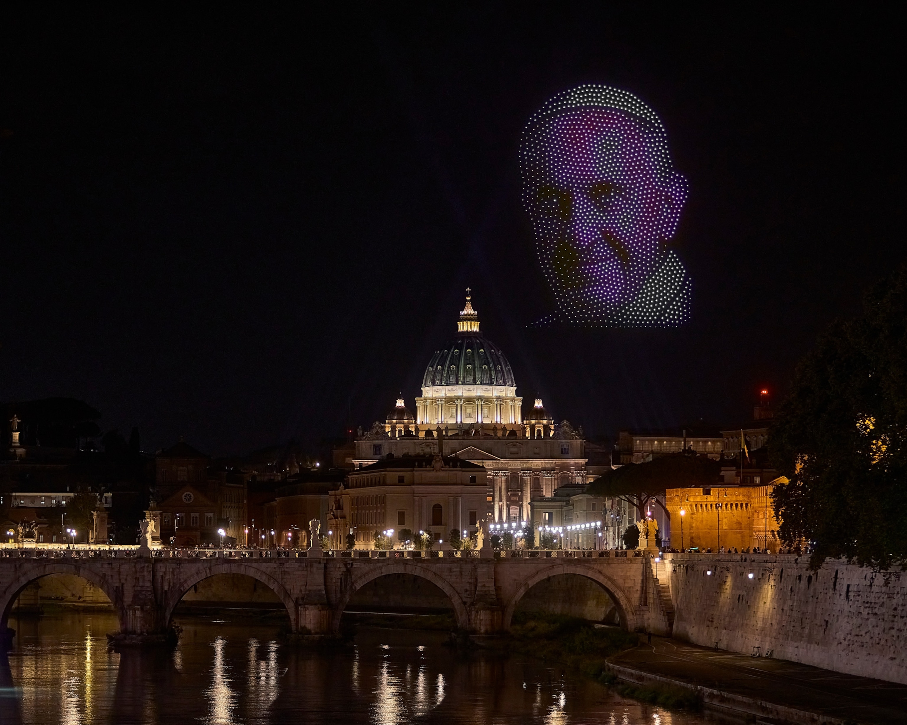 drones in the air forming the shape of a mans face