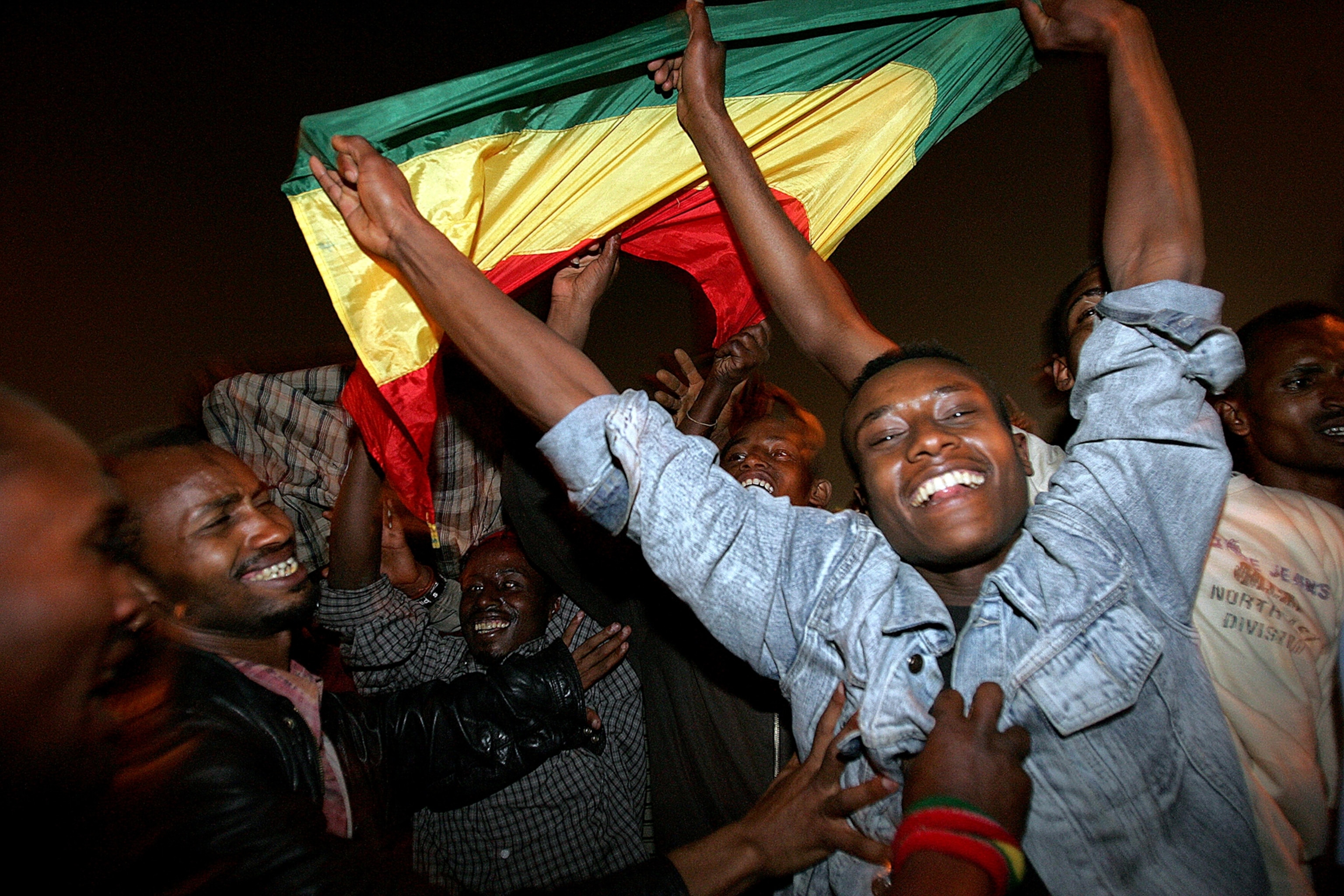 Ethiopians waving the Ethiopian flag as they celebrate the arrival of their new year in Addis Ababa