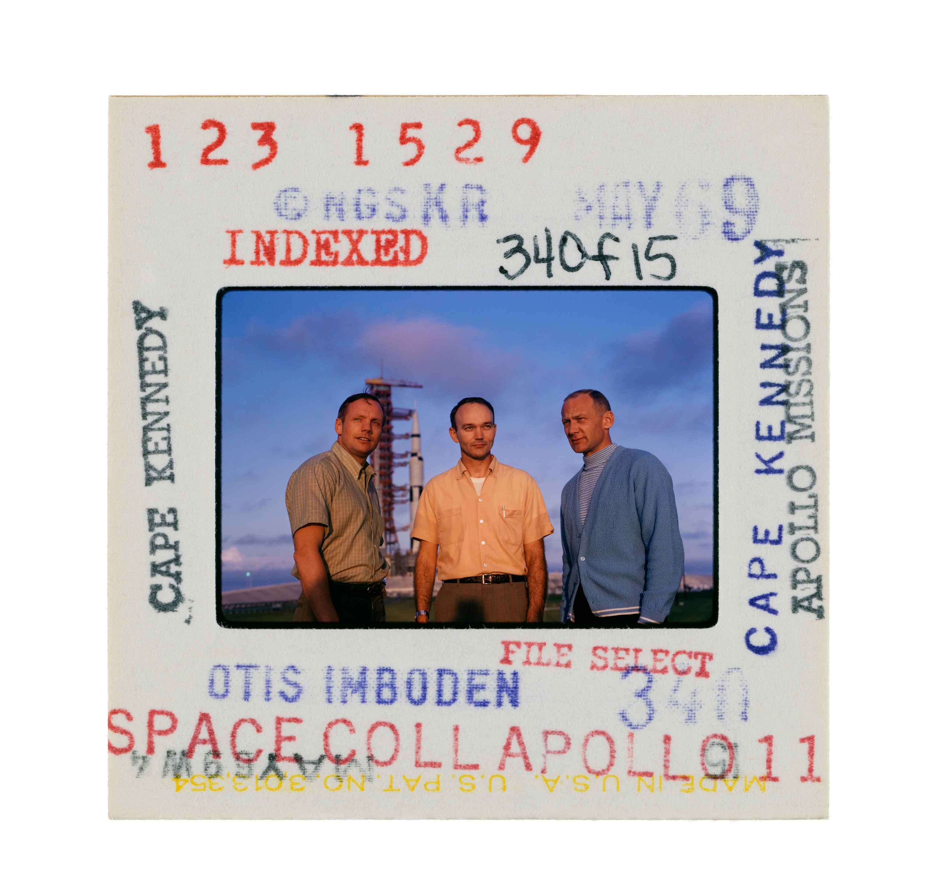 1969 photograph shows astronauts Armstrong, Collins, and Aldrin, Jr. standing near their spacecraft