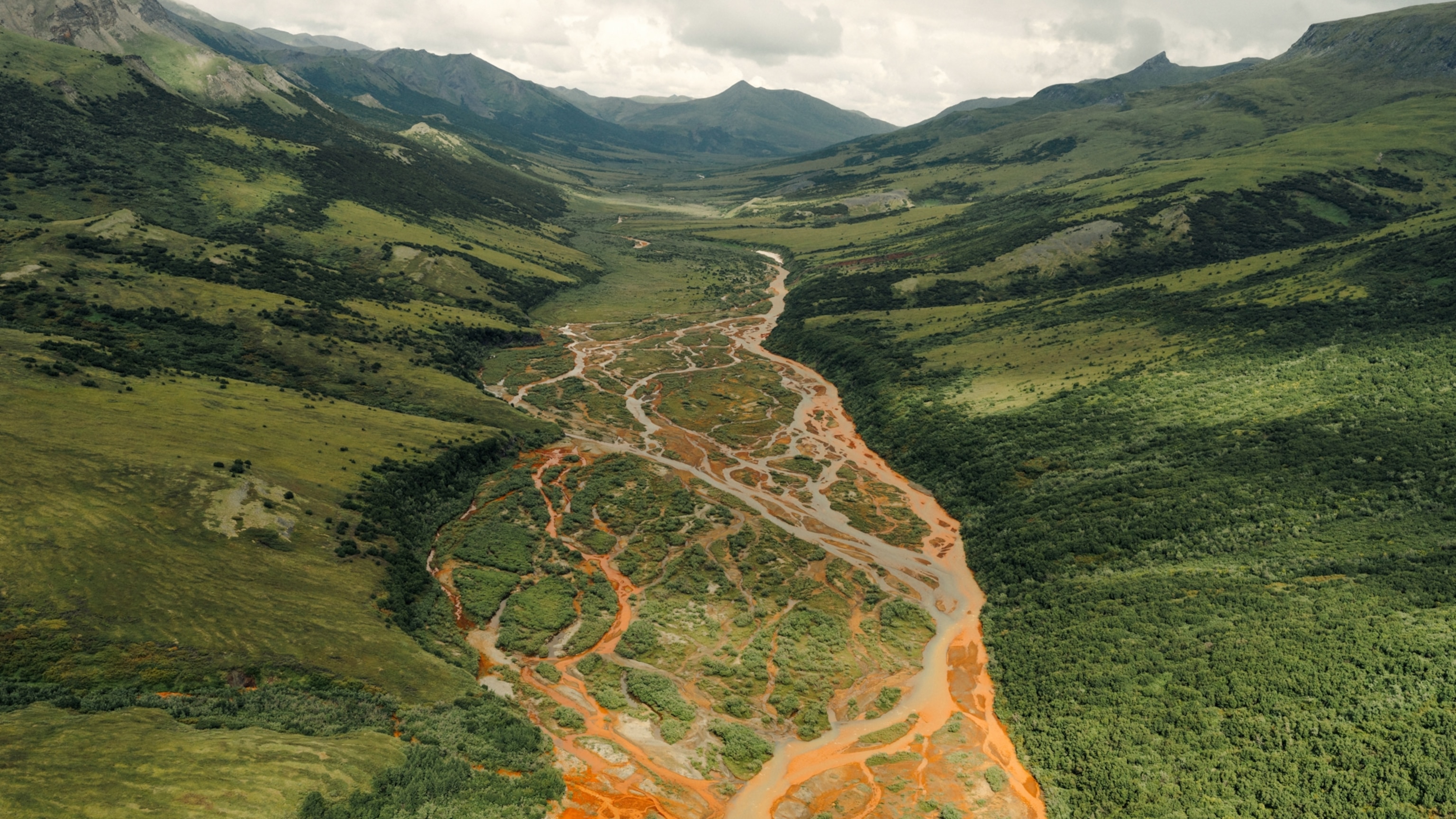 Why are Alaska’s rivers turning bright orange? Scientists have a theory.