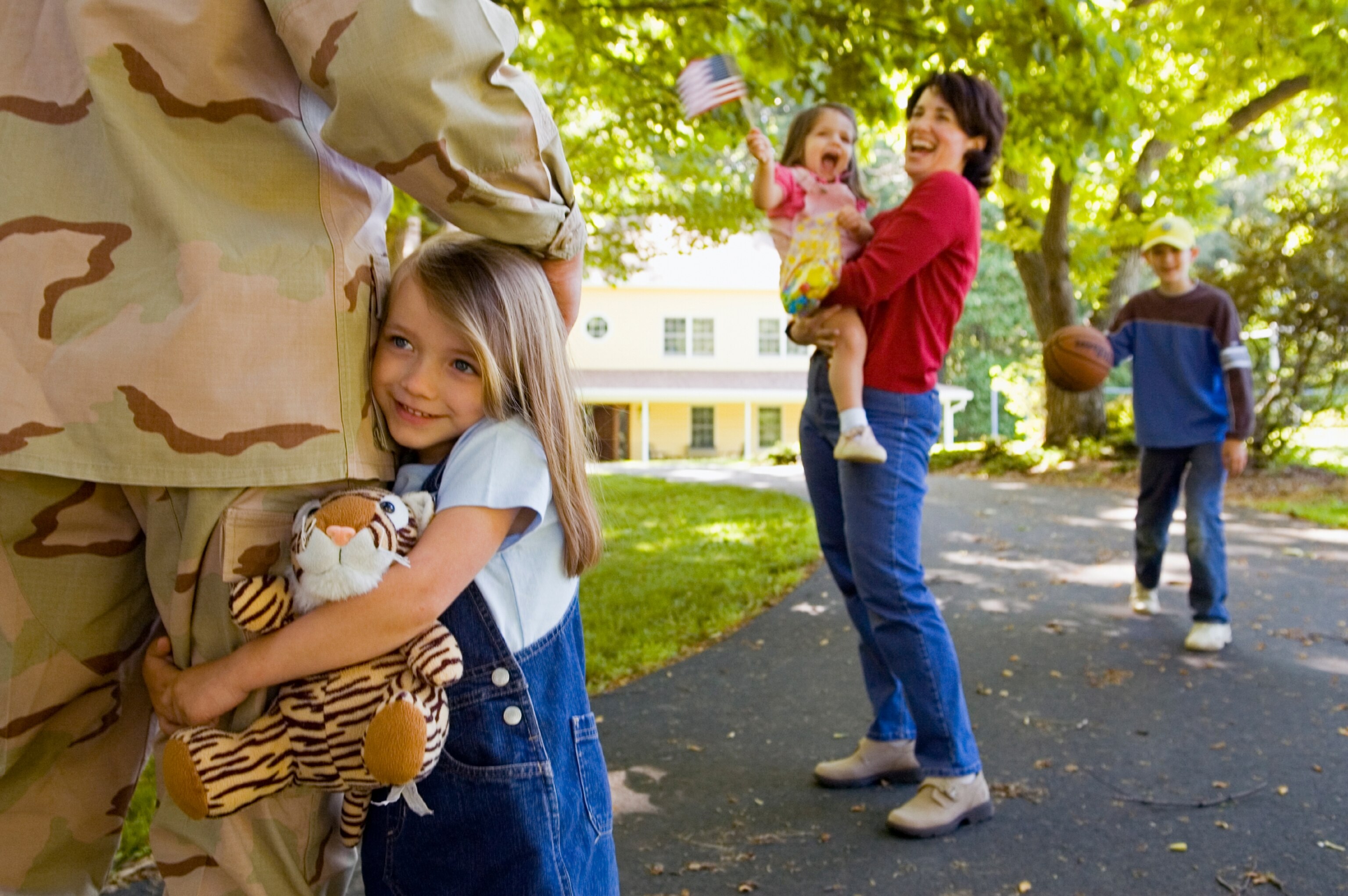 Army vet being welcomed home by family
