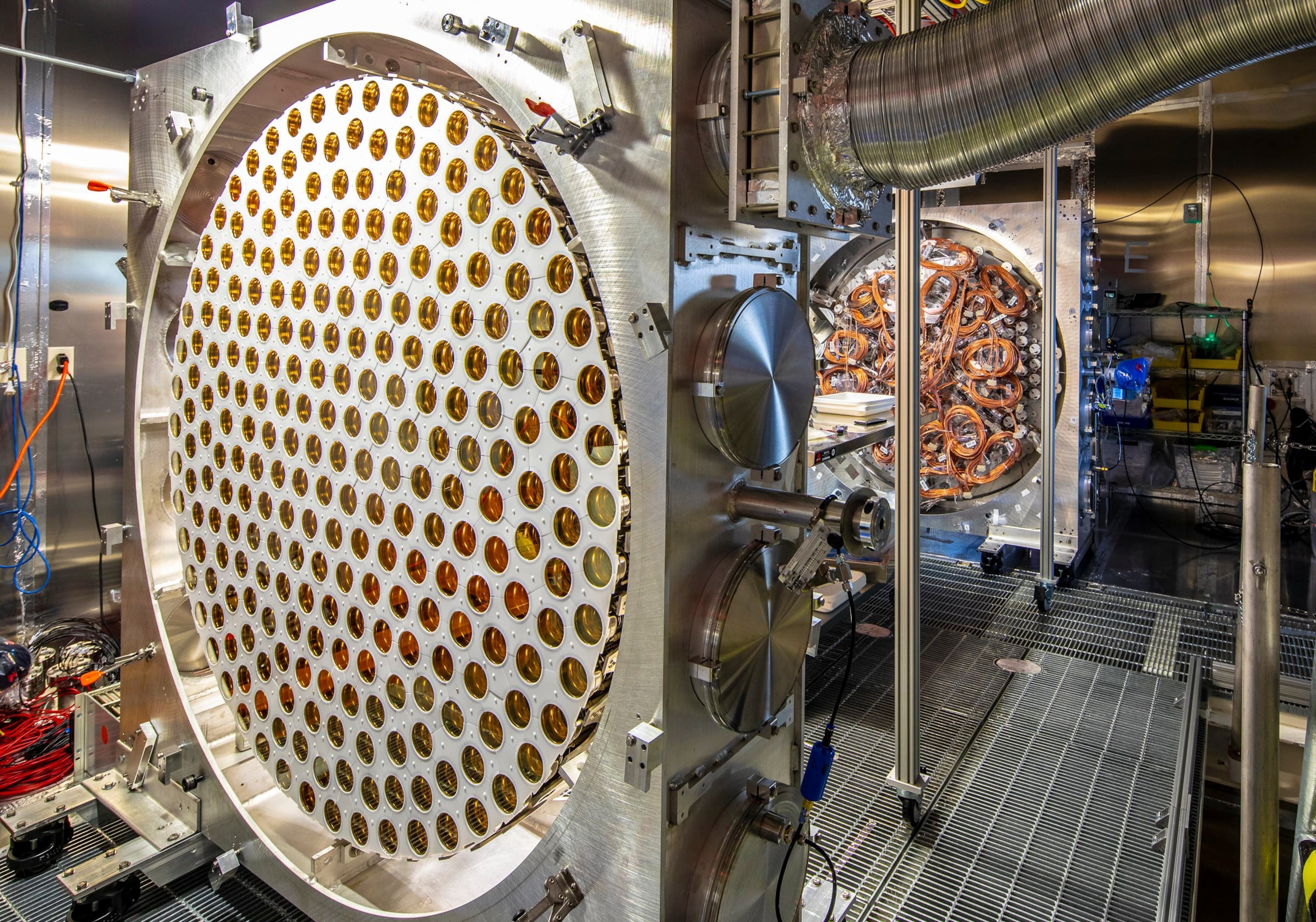 To search for dark matter, LZ uses photomultiplier tubes (shown here before installation in the detector) to capture light from particle interactions.