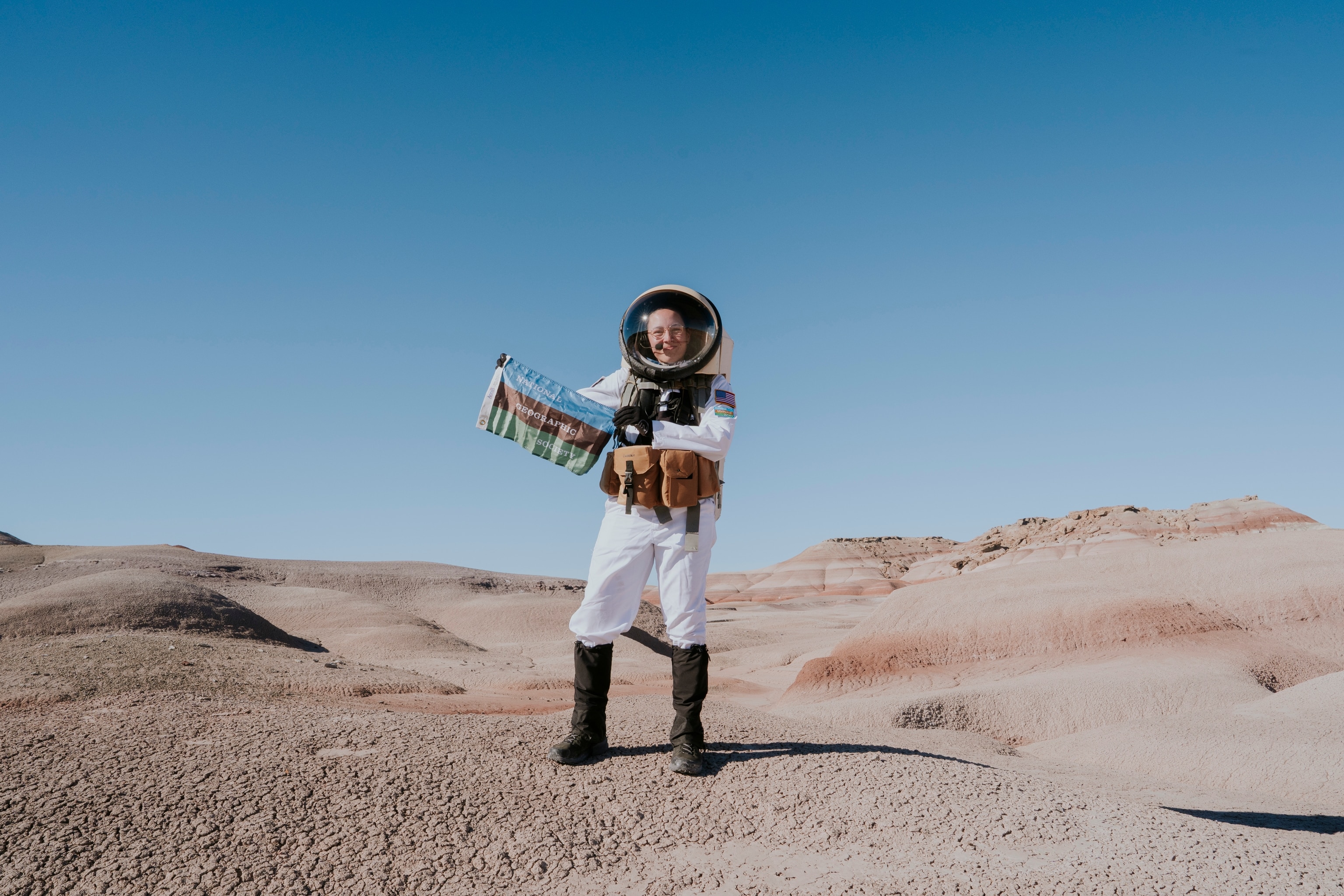 Crew Journalist Mackenzie Calle of Ares 1 crew on an EVA on Sol 6 at Mars Desert Research Station outside of Hanksville, Utah on October 18, 2025.