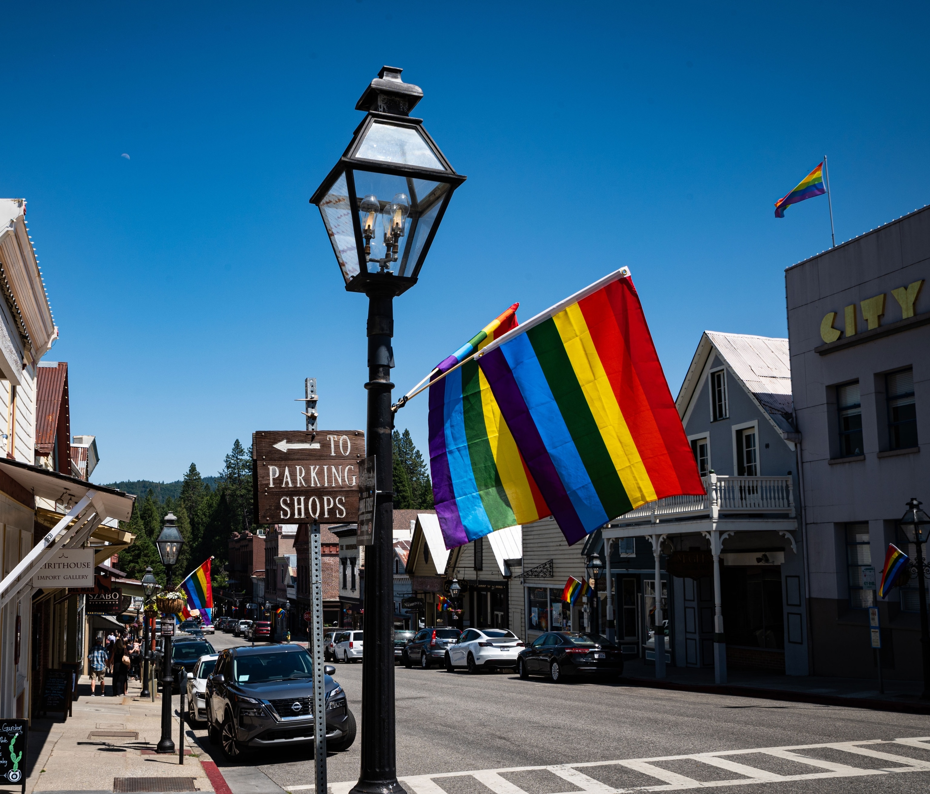 Street view of Nevada city with pride flags.
