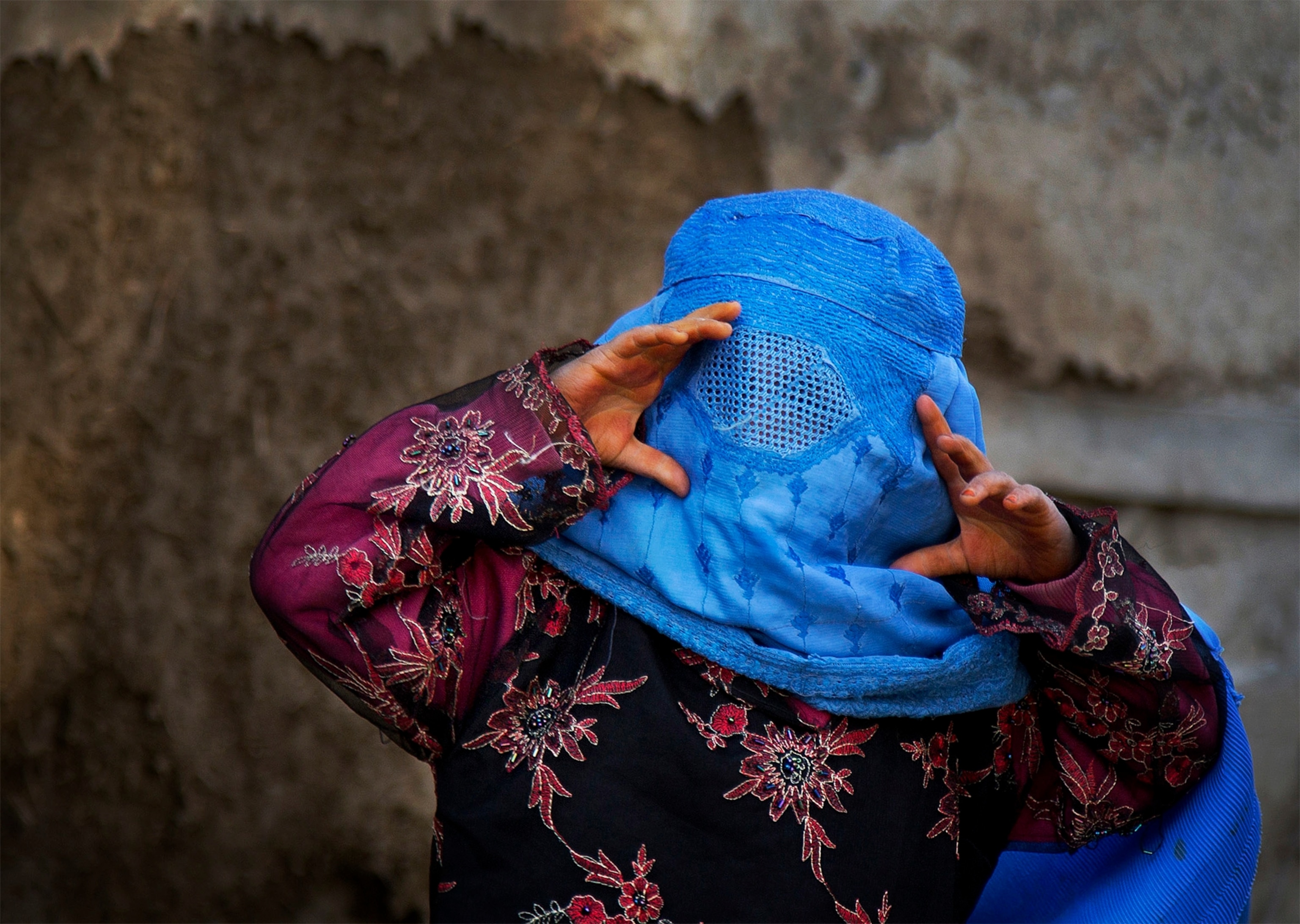 an Afghan National Police officer manning a checkpoint.