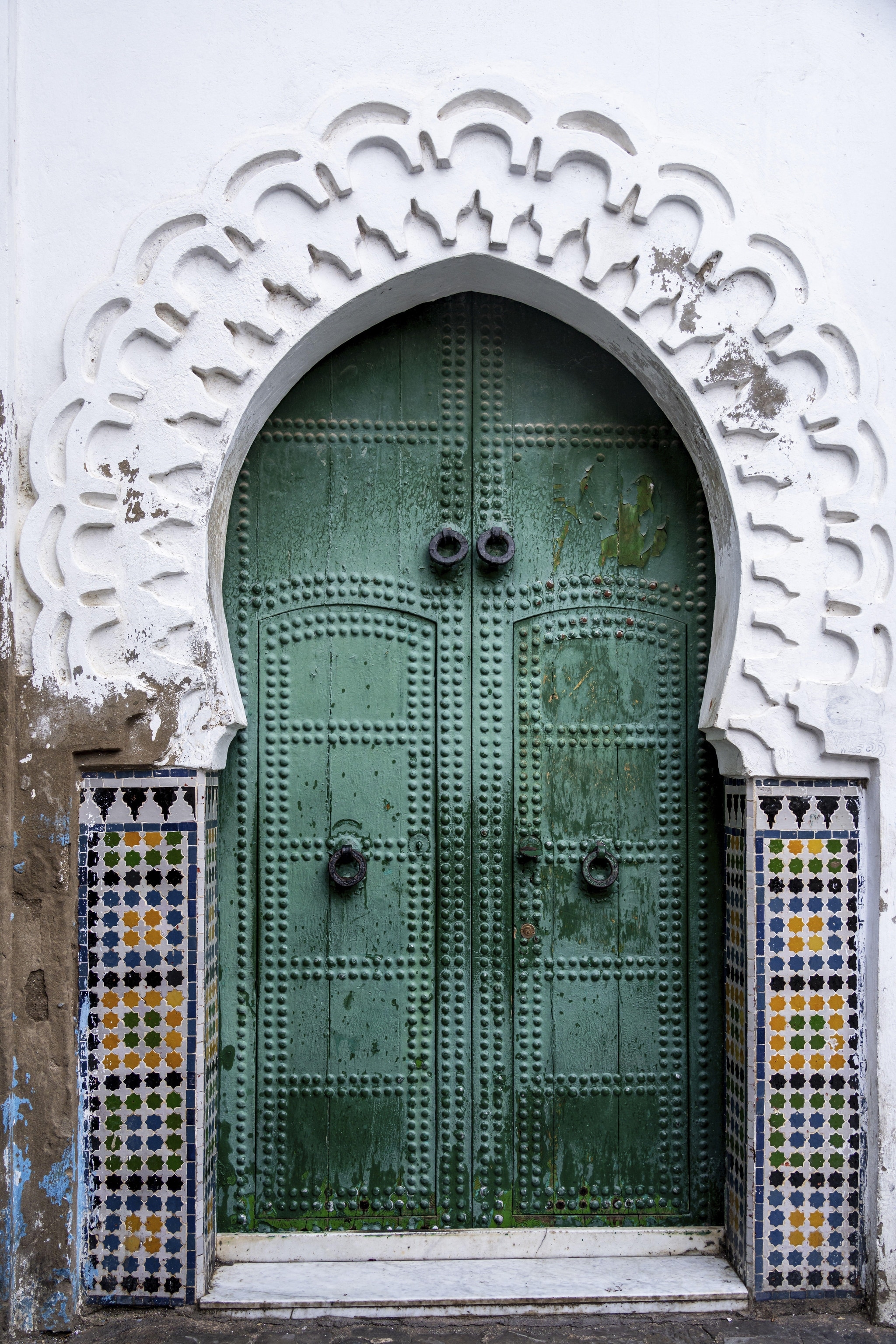 Decorated green doorway