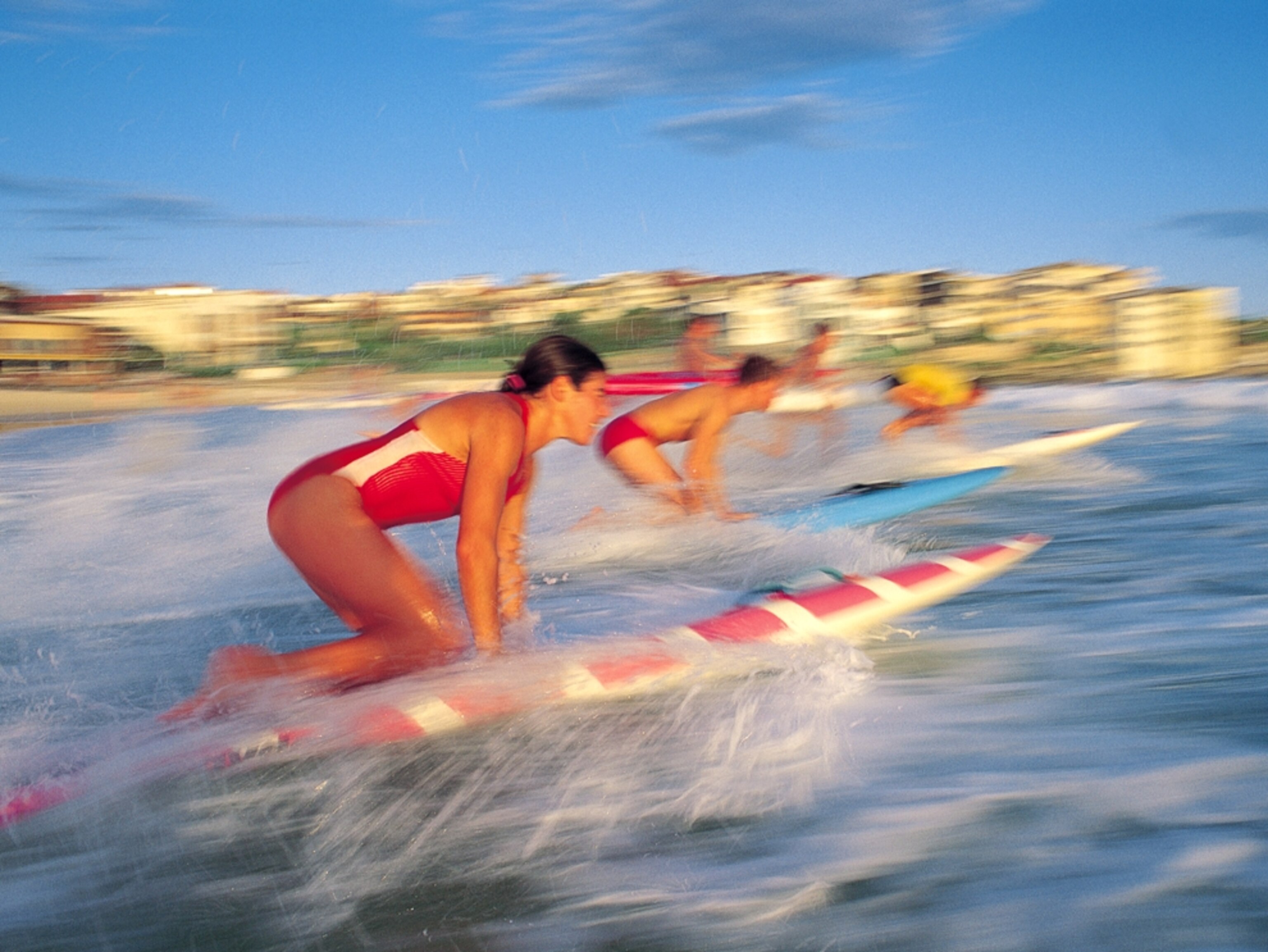 Lifeguard on surfboard
