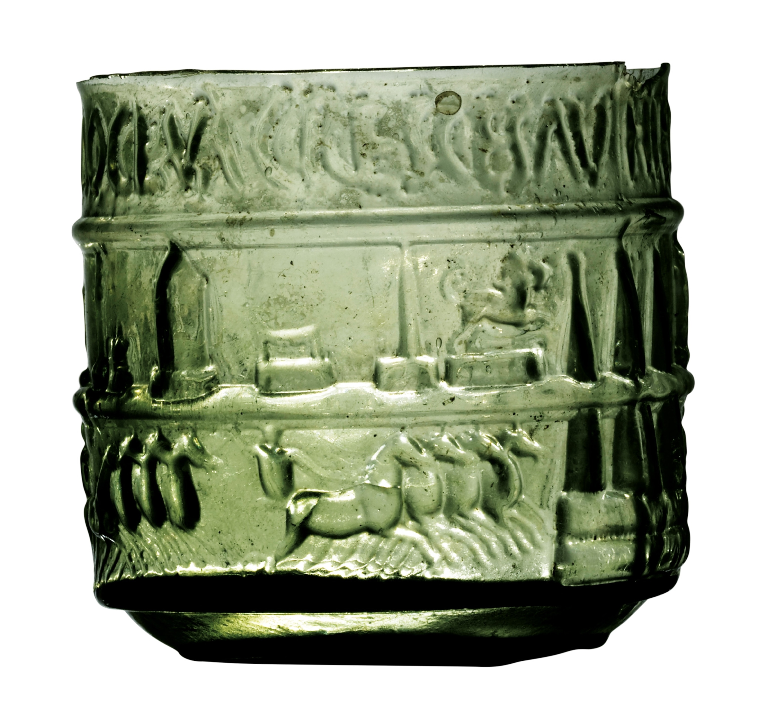 A green ceramic glass with horses on the side