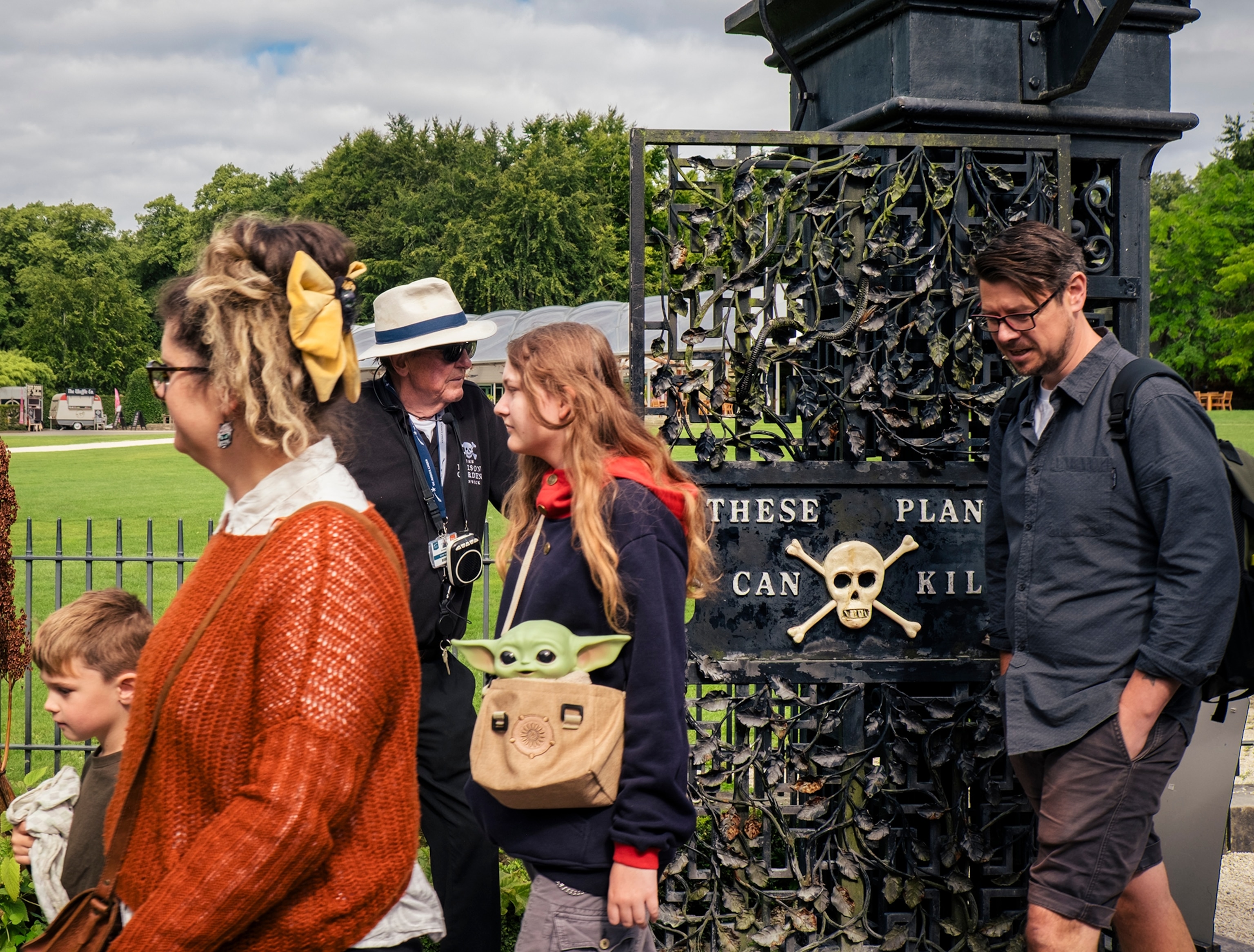 Group of visitors at the entry gate.