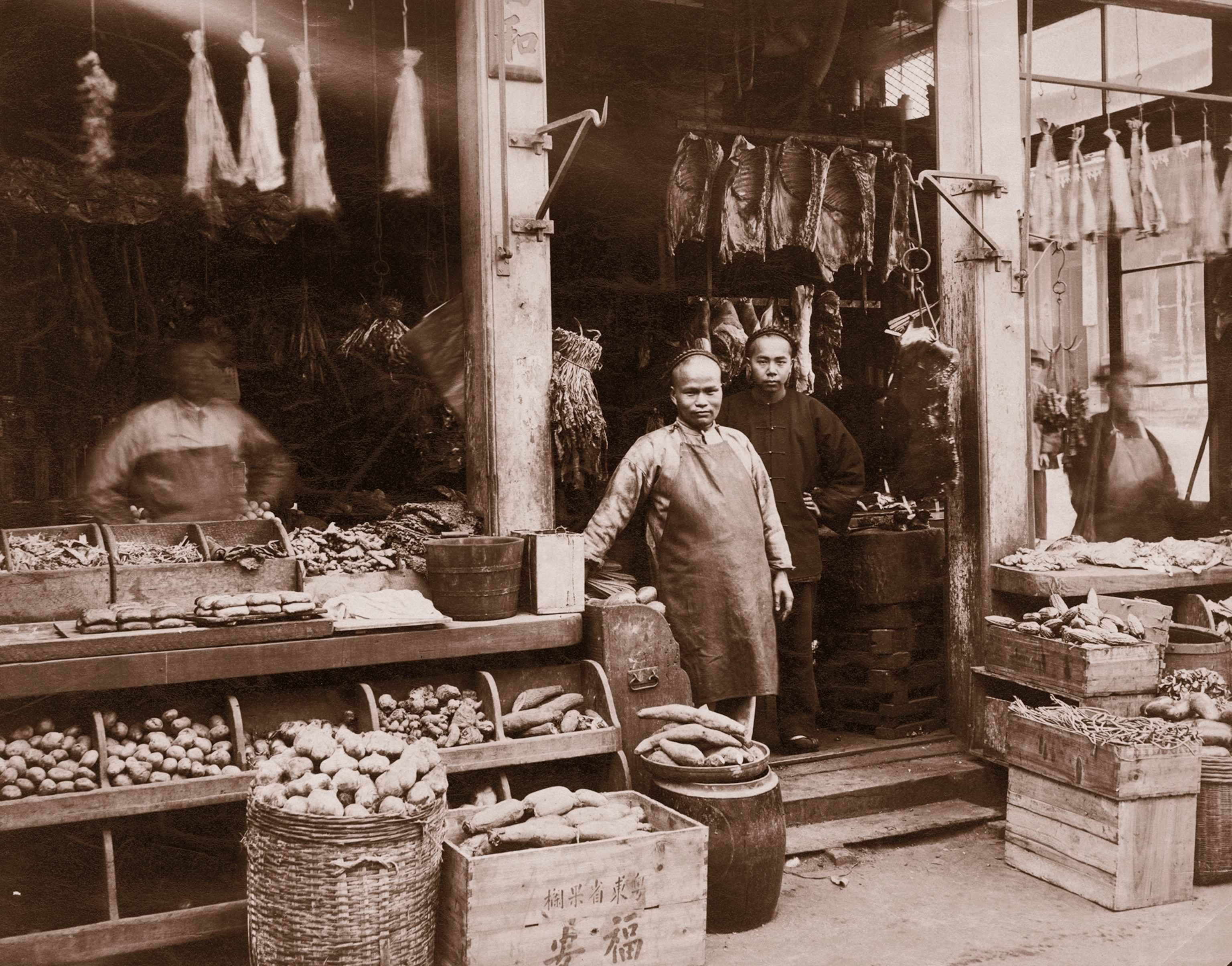 Chinese immigrants to the United States established successful businesses, like this butcher and grocery store, photographed in the 1880s in San Francisco, California.