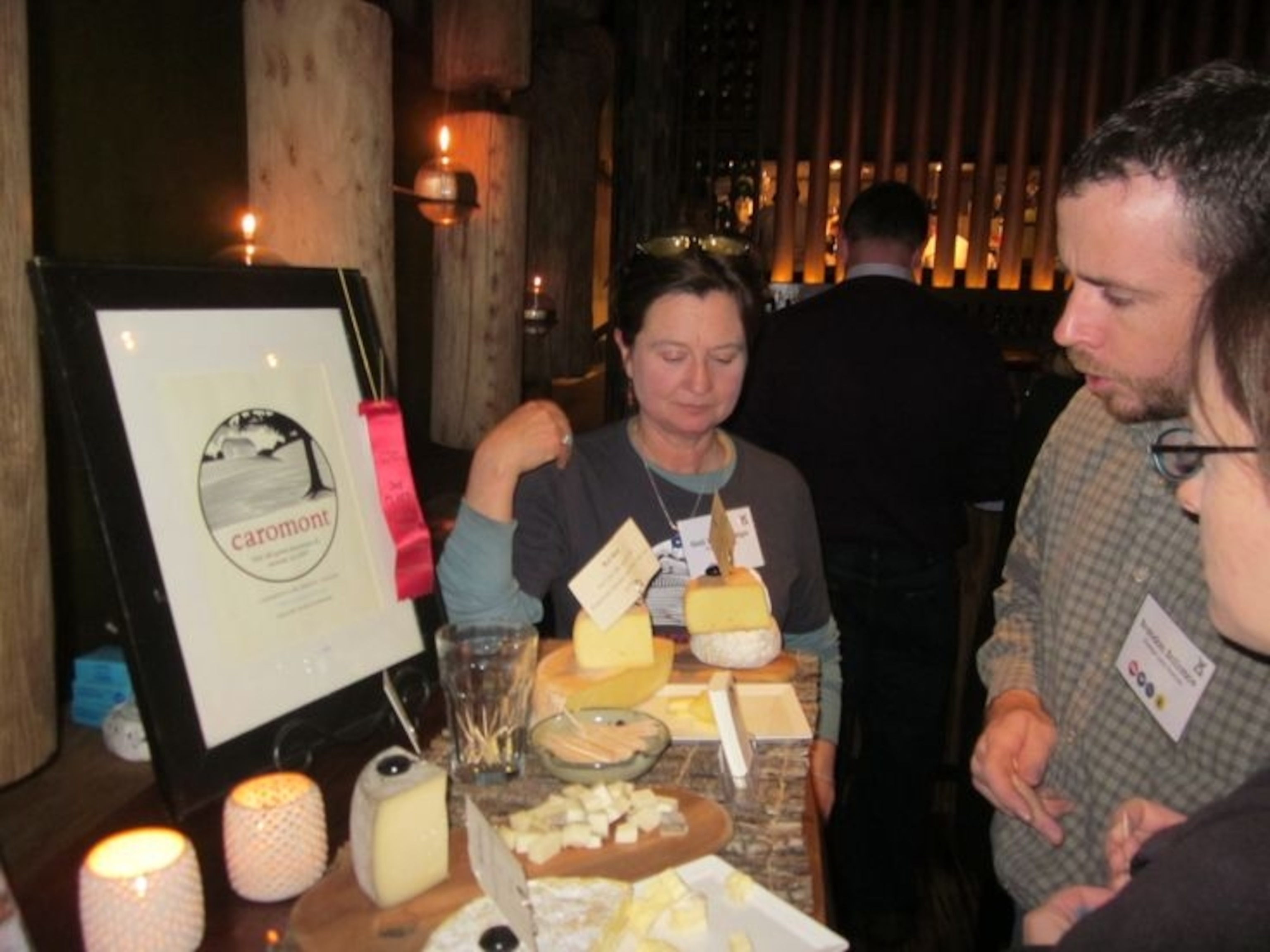 a farmer giving a demo of her product to a group of chefs.