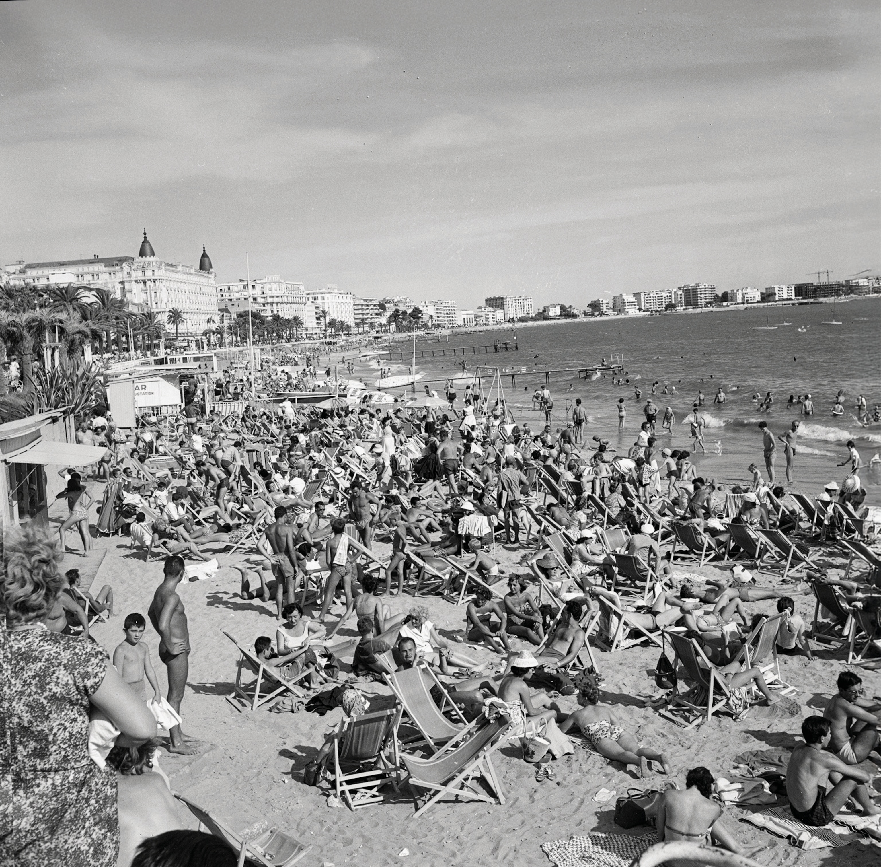 Space is at a premium as deck chairs crowd the beach in Cannes.