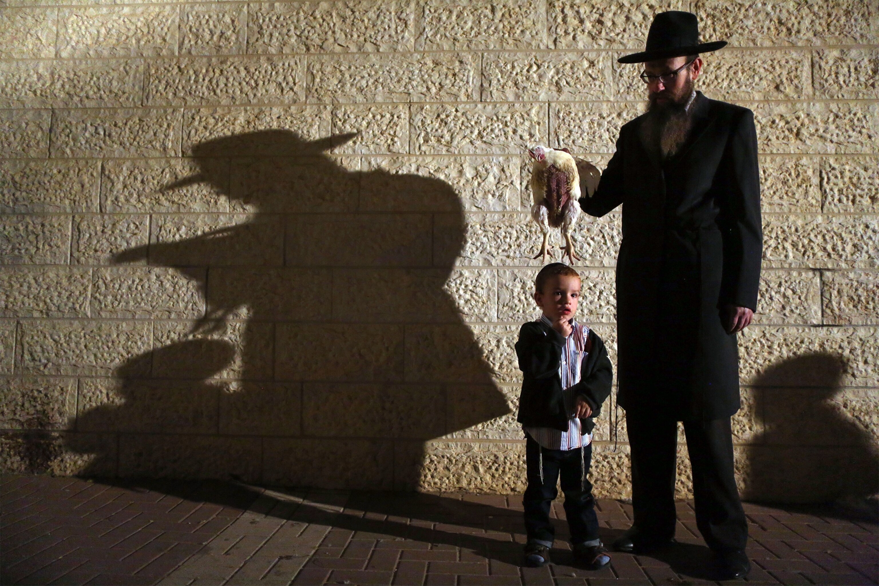 Ultra Orthodox Jews performing the Kaparot ceremony