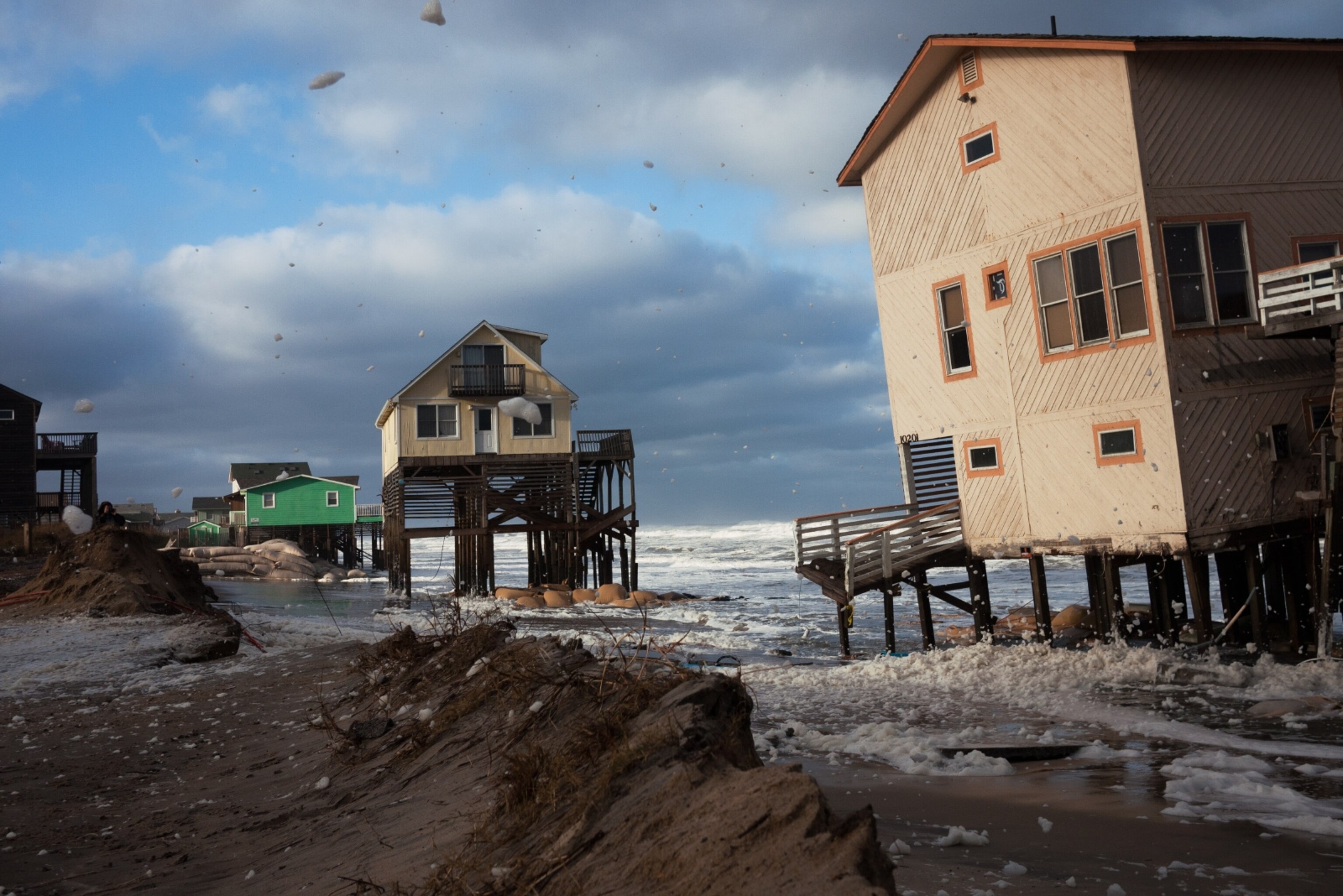 November waves crashing against vacation homes on South Nags Head