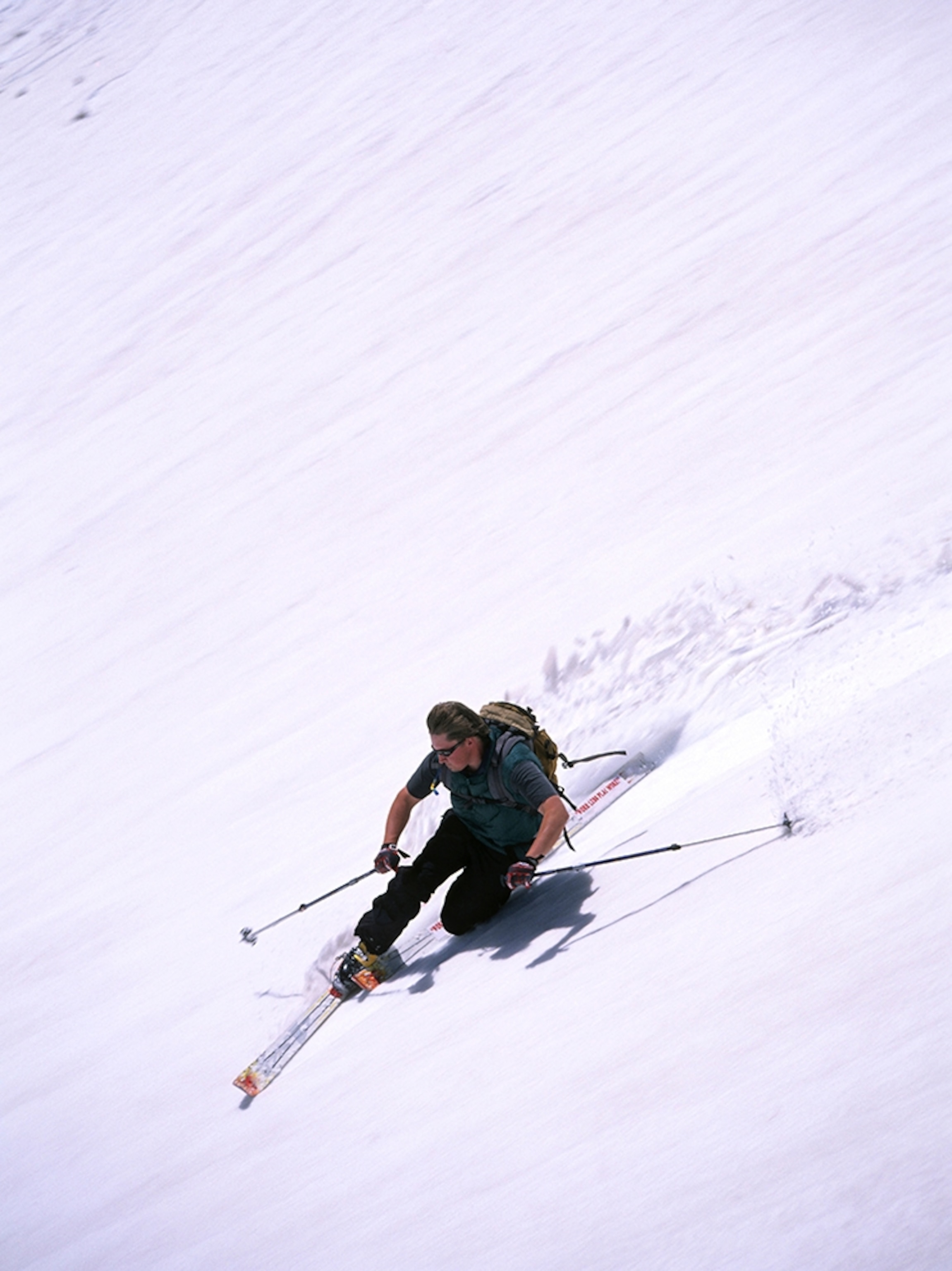 a telemark skier on the slopes of Beartooth Pass, Montana