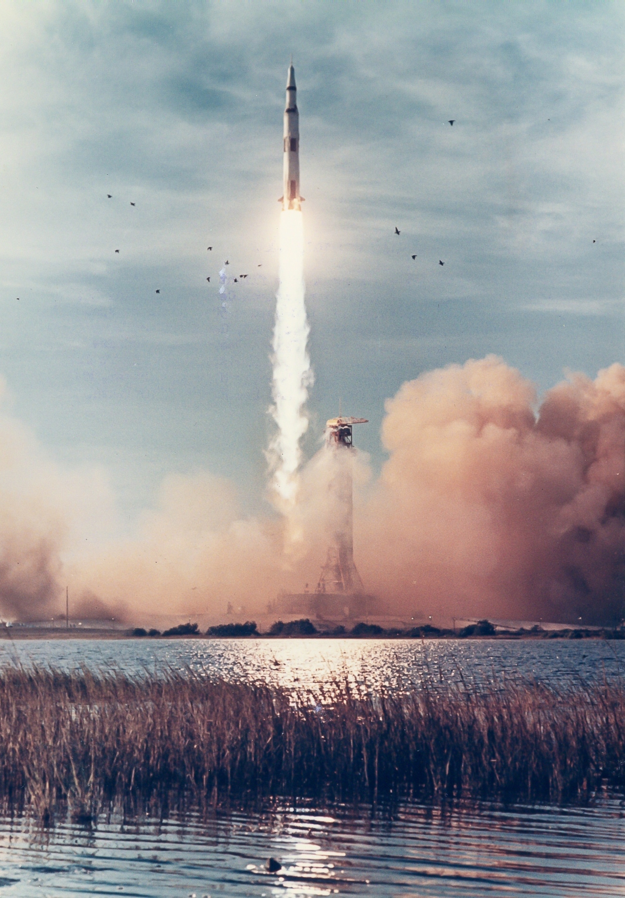 the Apollo 8 lifting off into space in 1968