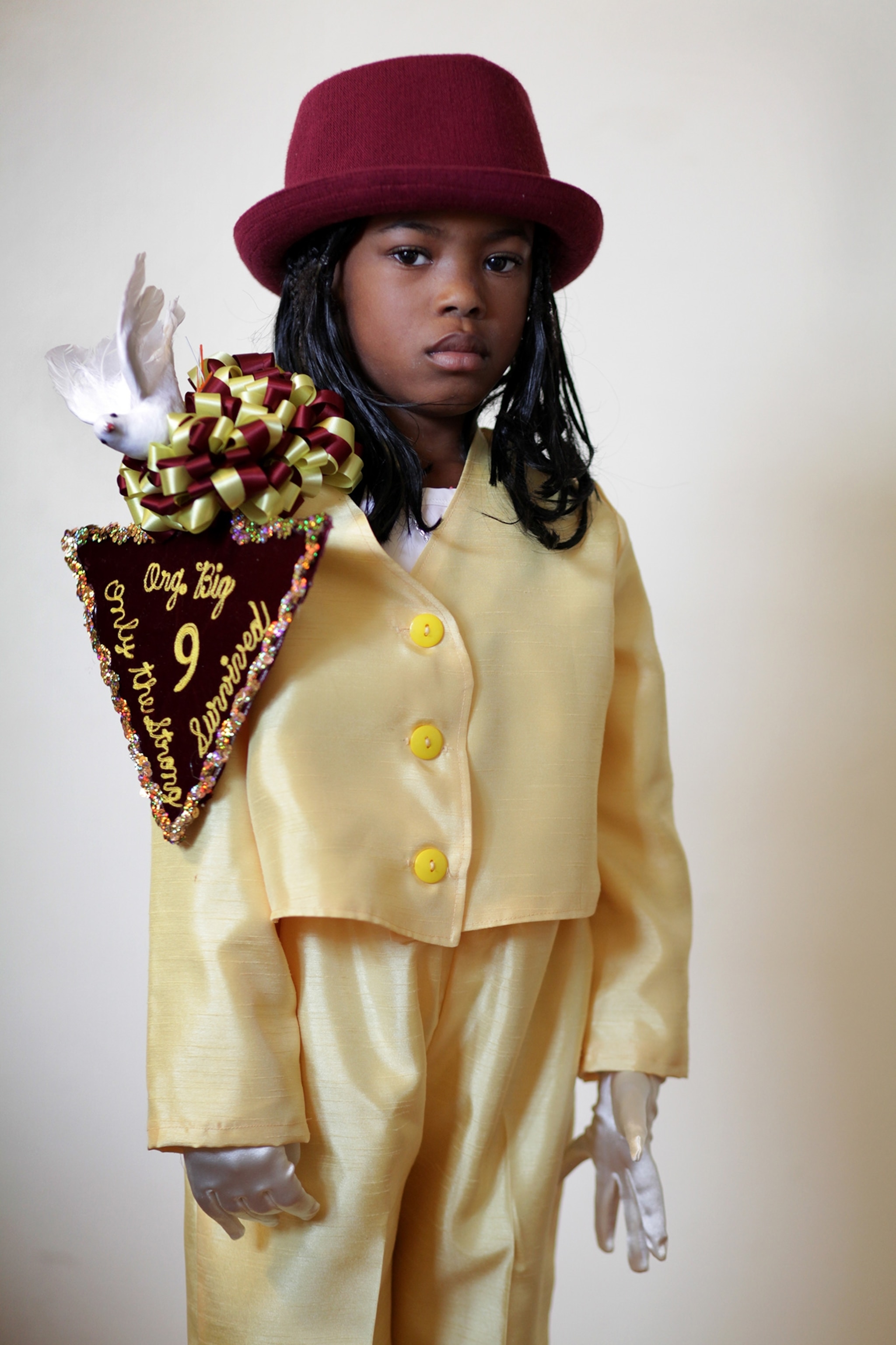 Ka'Yenne Waterhouse, 5, posing for a portrait in full costume of the first division of the Big Nine in New Orleans.