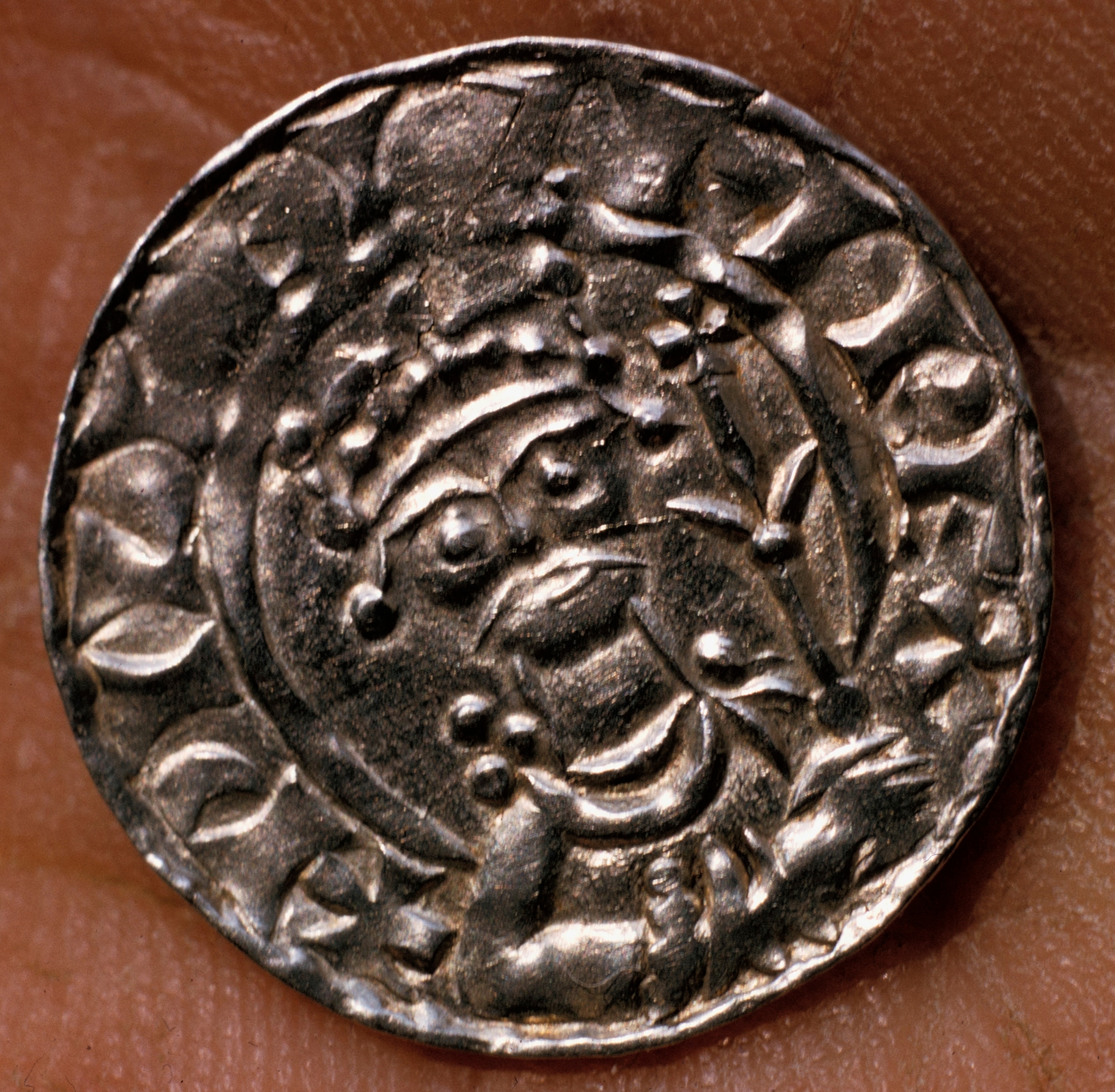 A rare silver penny with the face of William I.