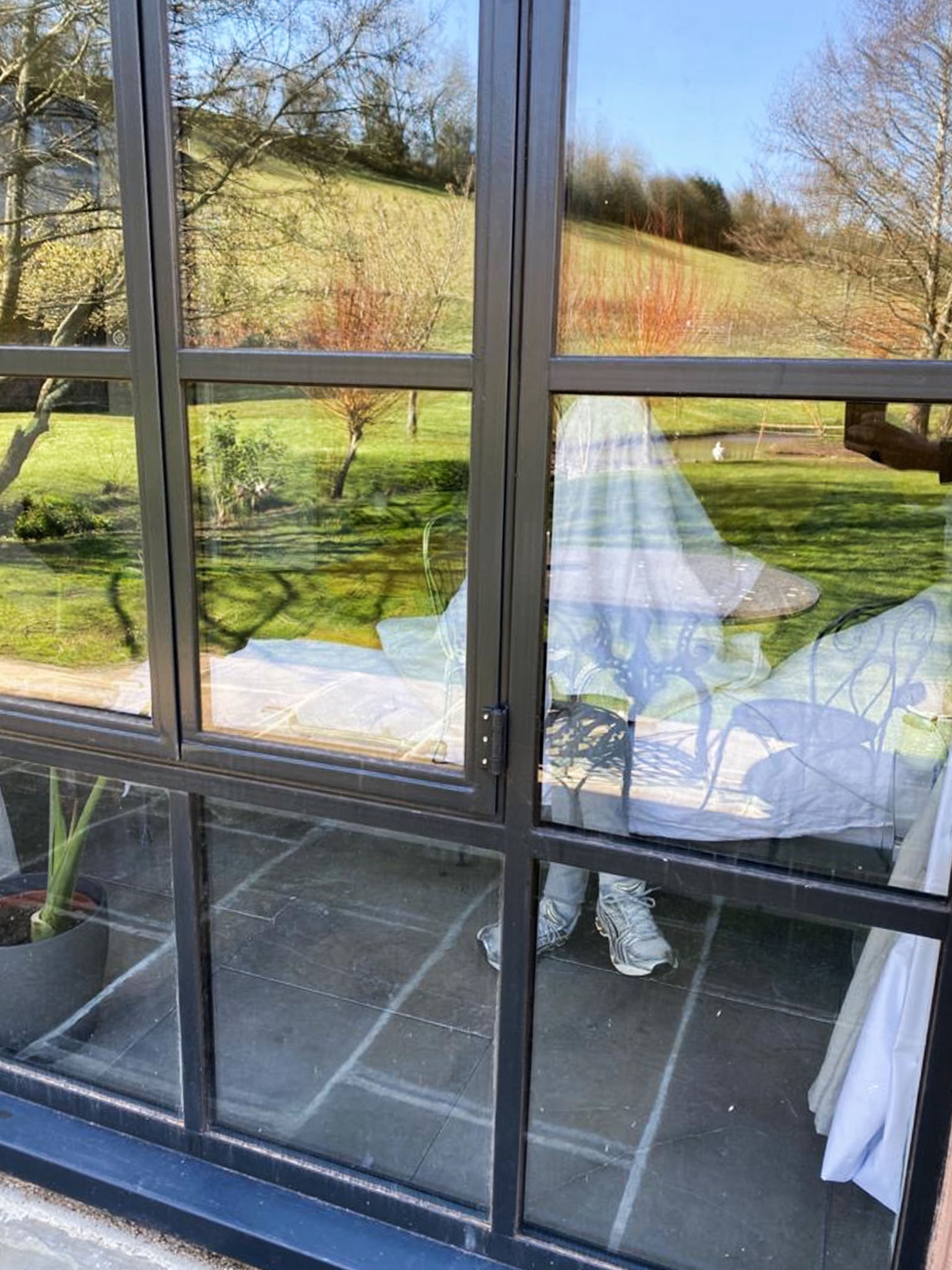 a photographer doing an interview under a blanket in England