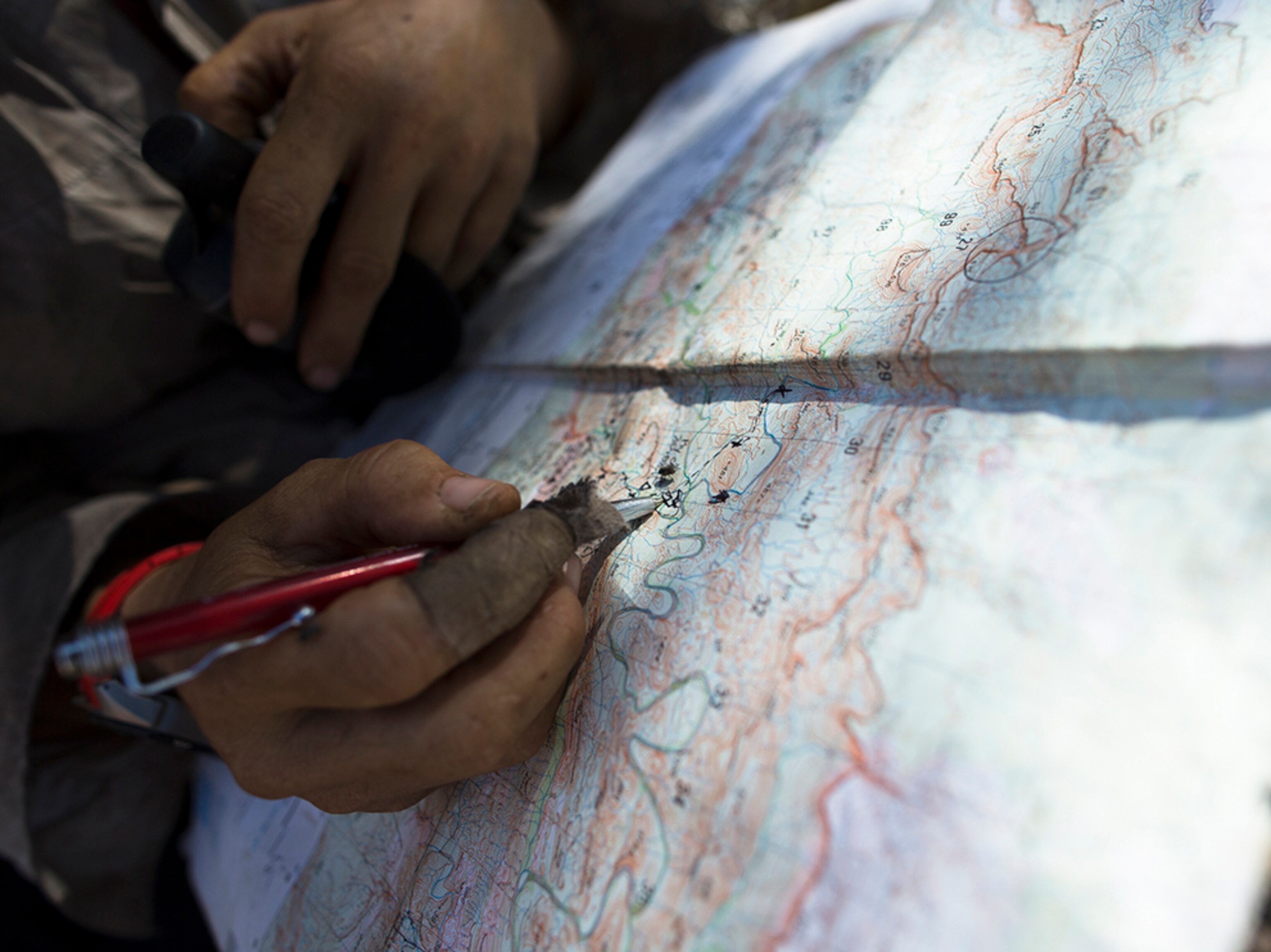 Sarah Marquis using a map to navigate.