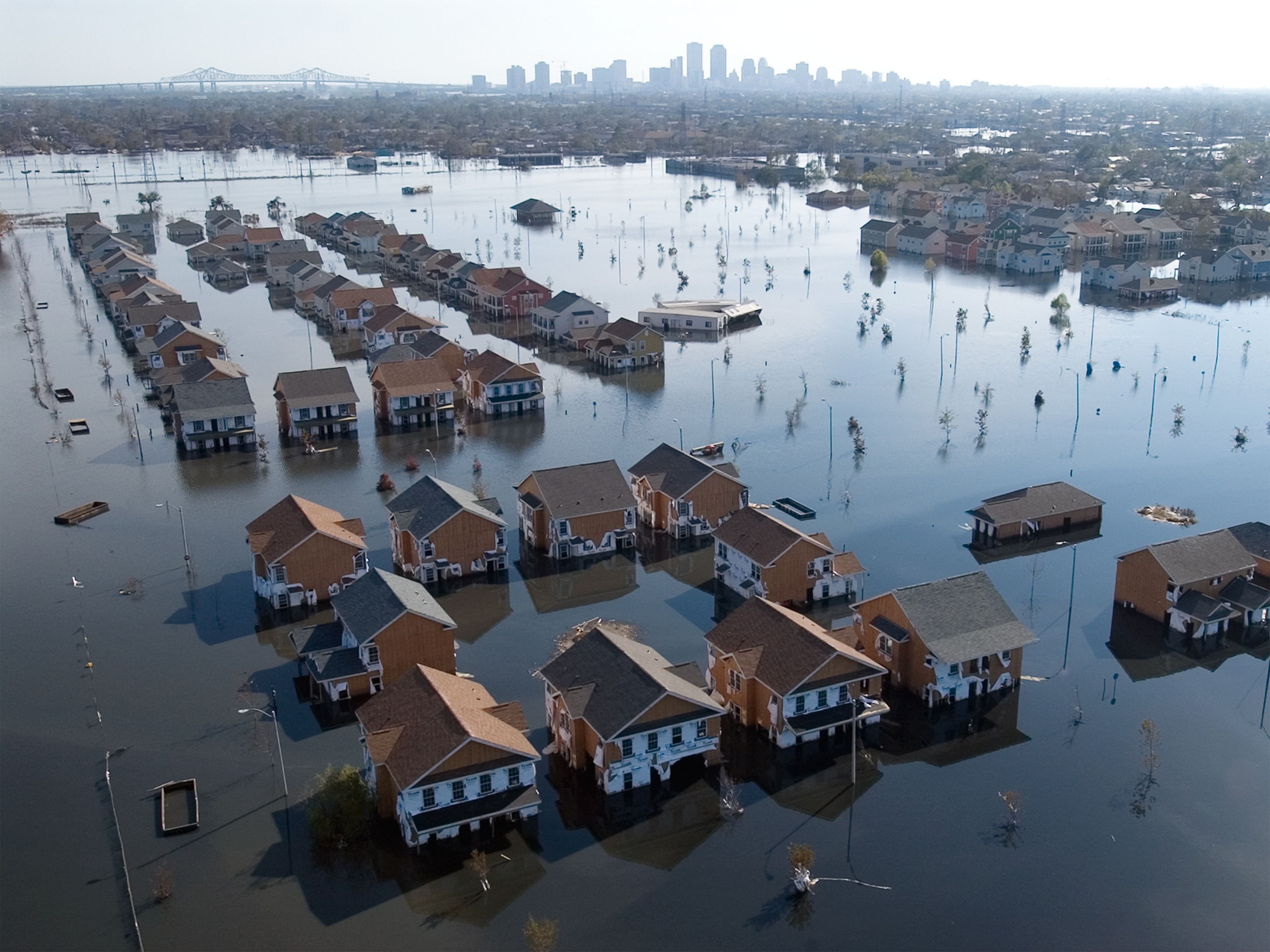 Homes are submerged after Category 5 hurricane Katrina's passage.