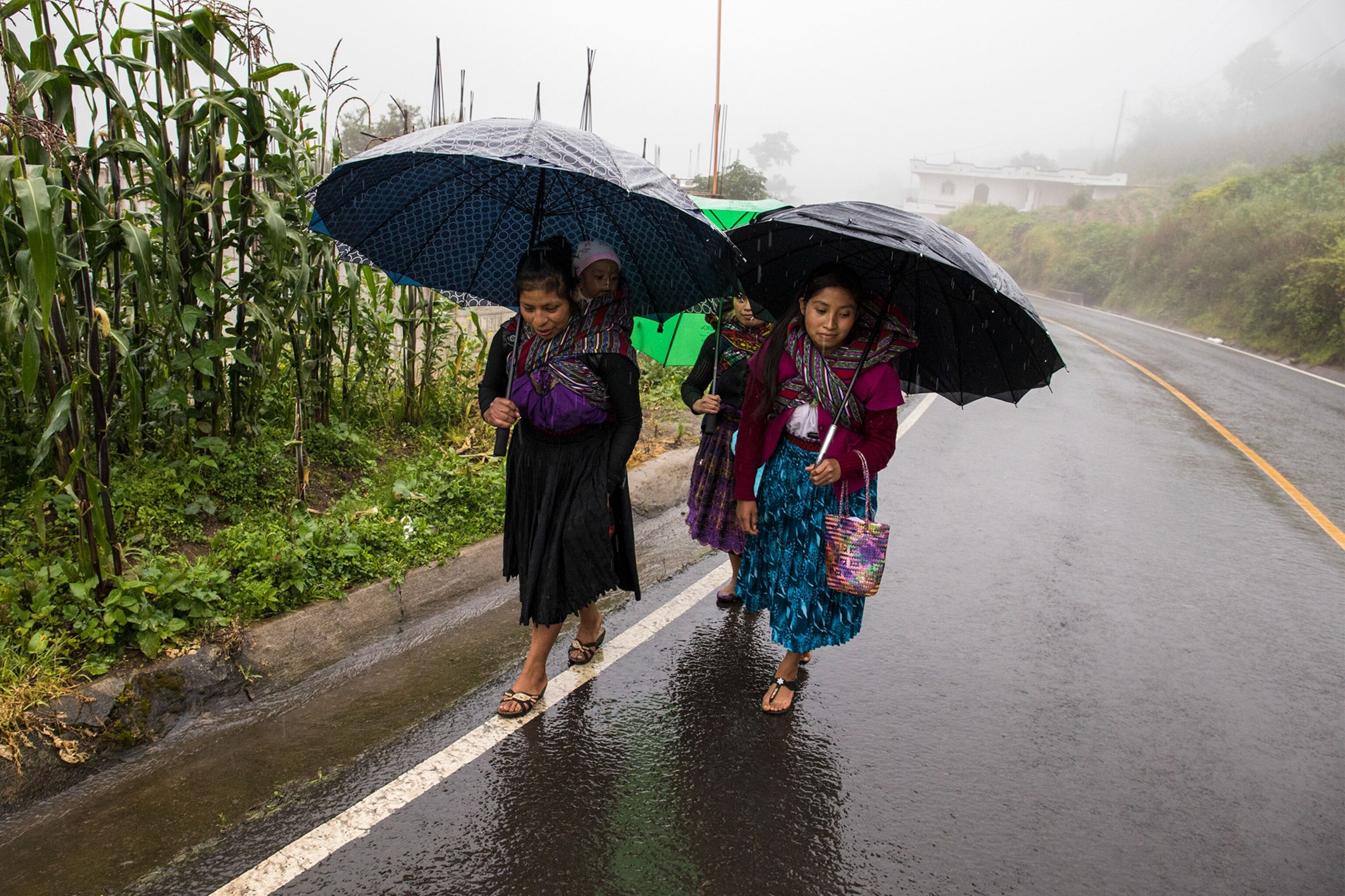 women walking down the road in Guatemala