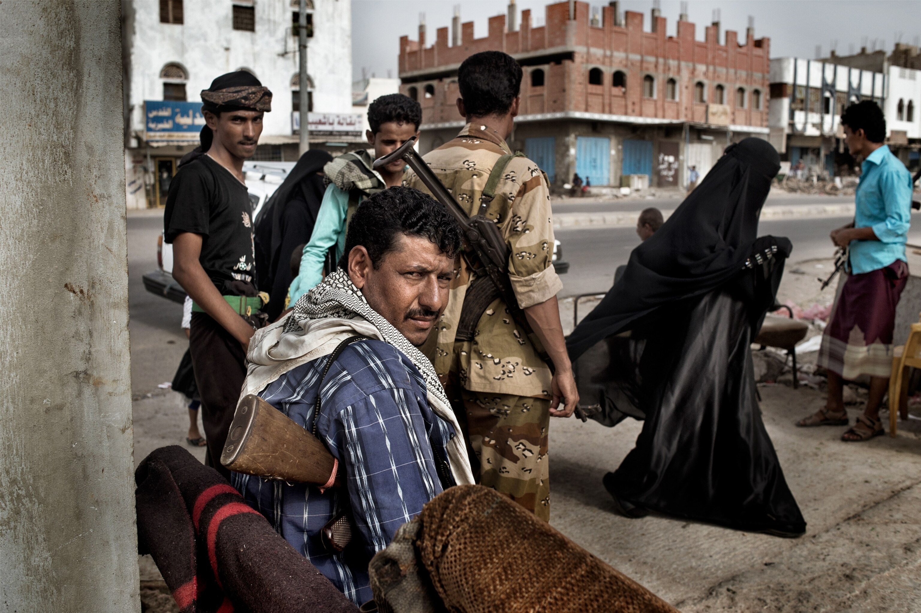 Local fighters guard a government hospital in Jaar, Yemen.