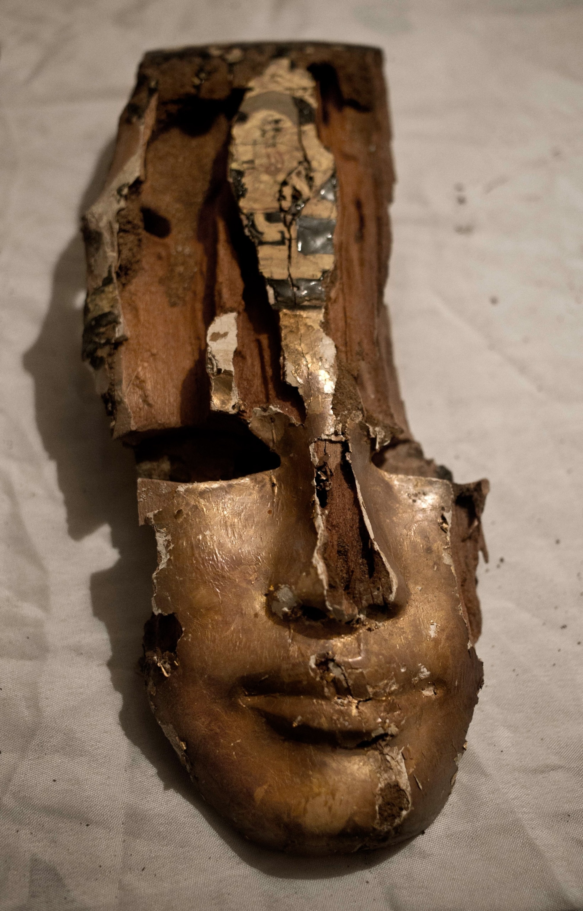 funerary mask in newly discovered tomb on Luxor's West Bank in Egypt