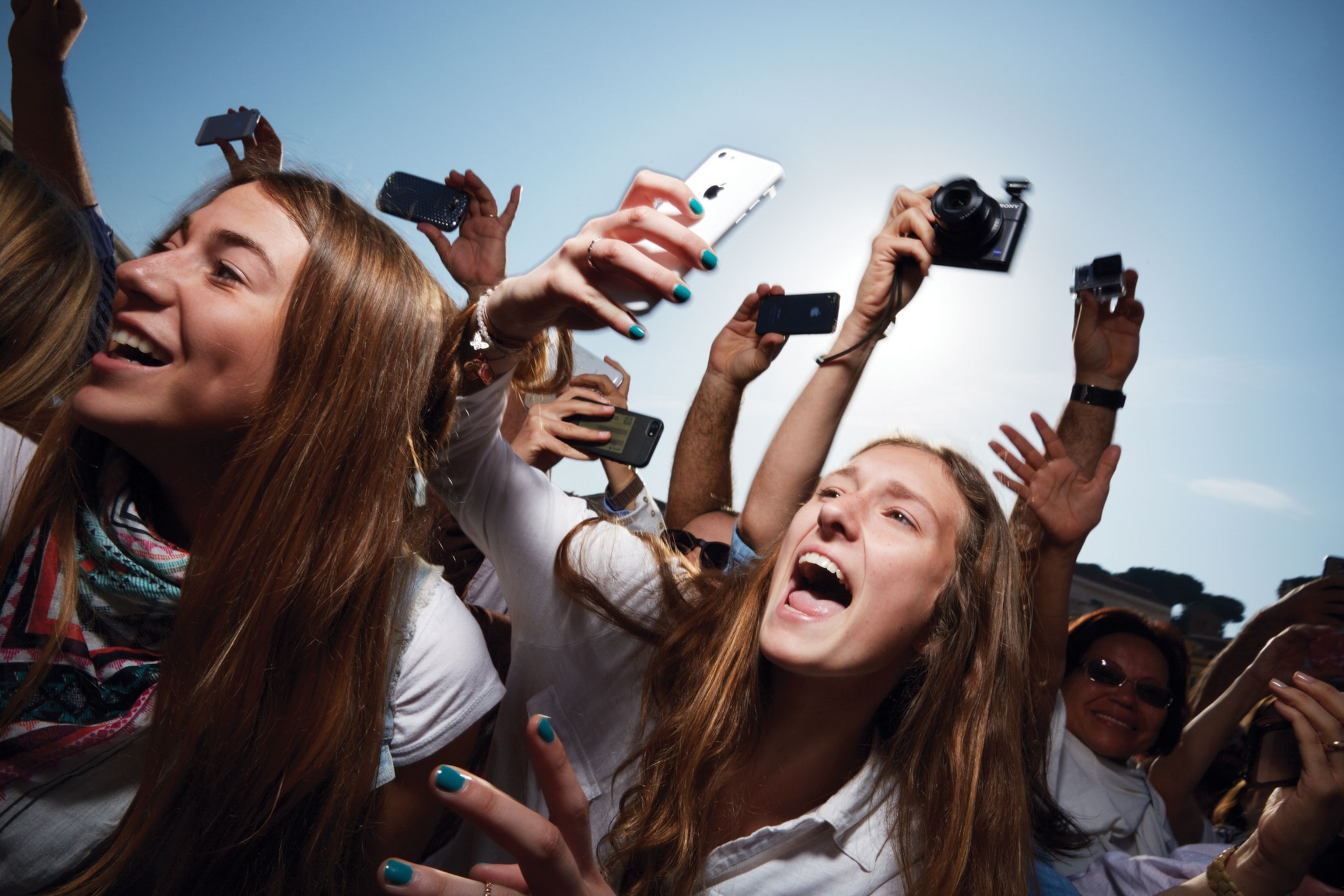 girls screaming while they wait to see Pope Francis