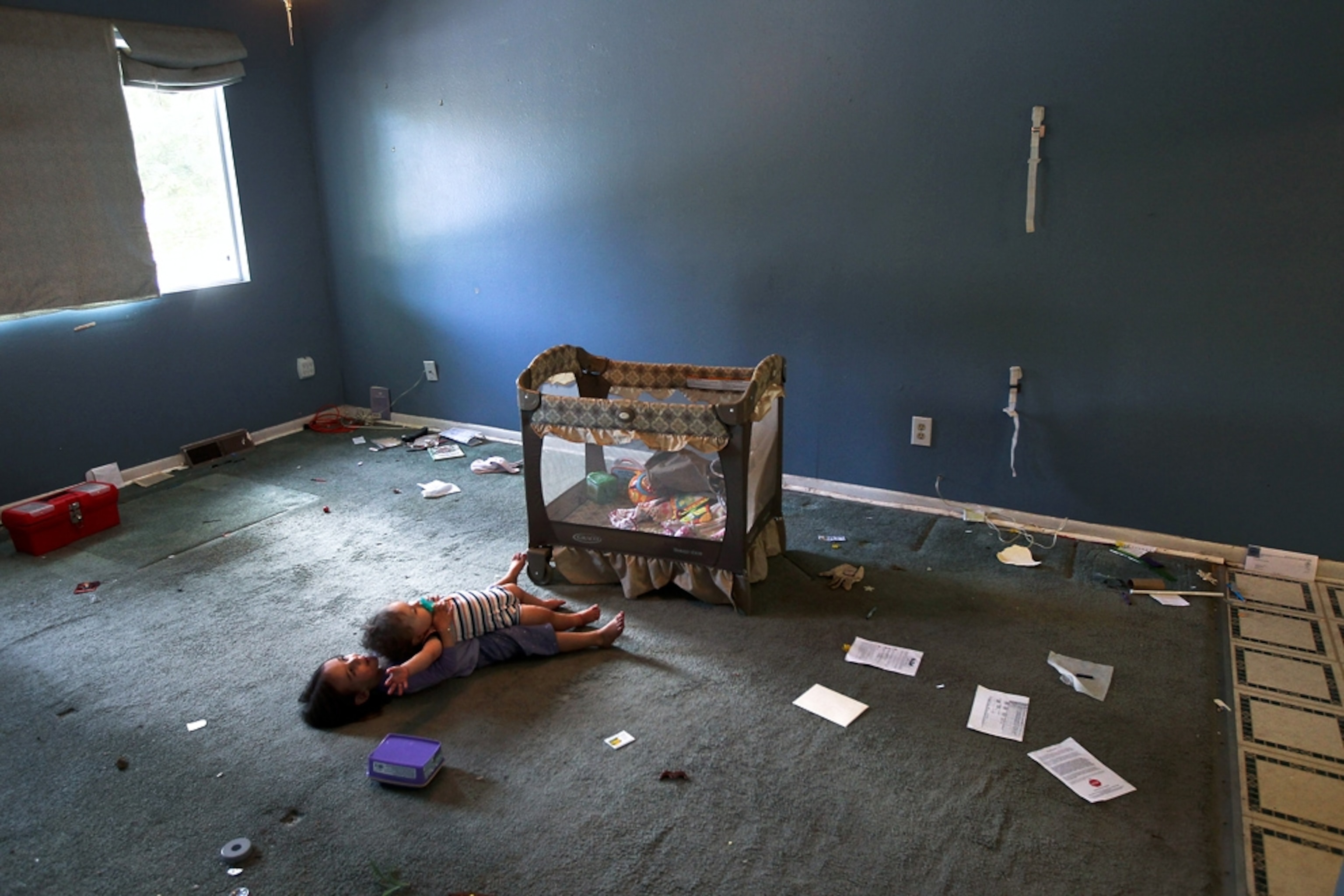 Foreclosure picture: children in a house in Colorado -- for best pictures of October photo gallery