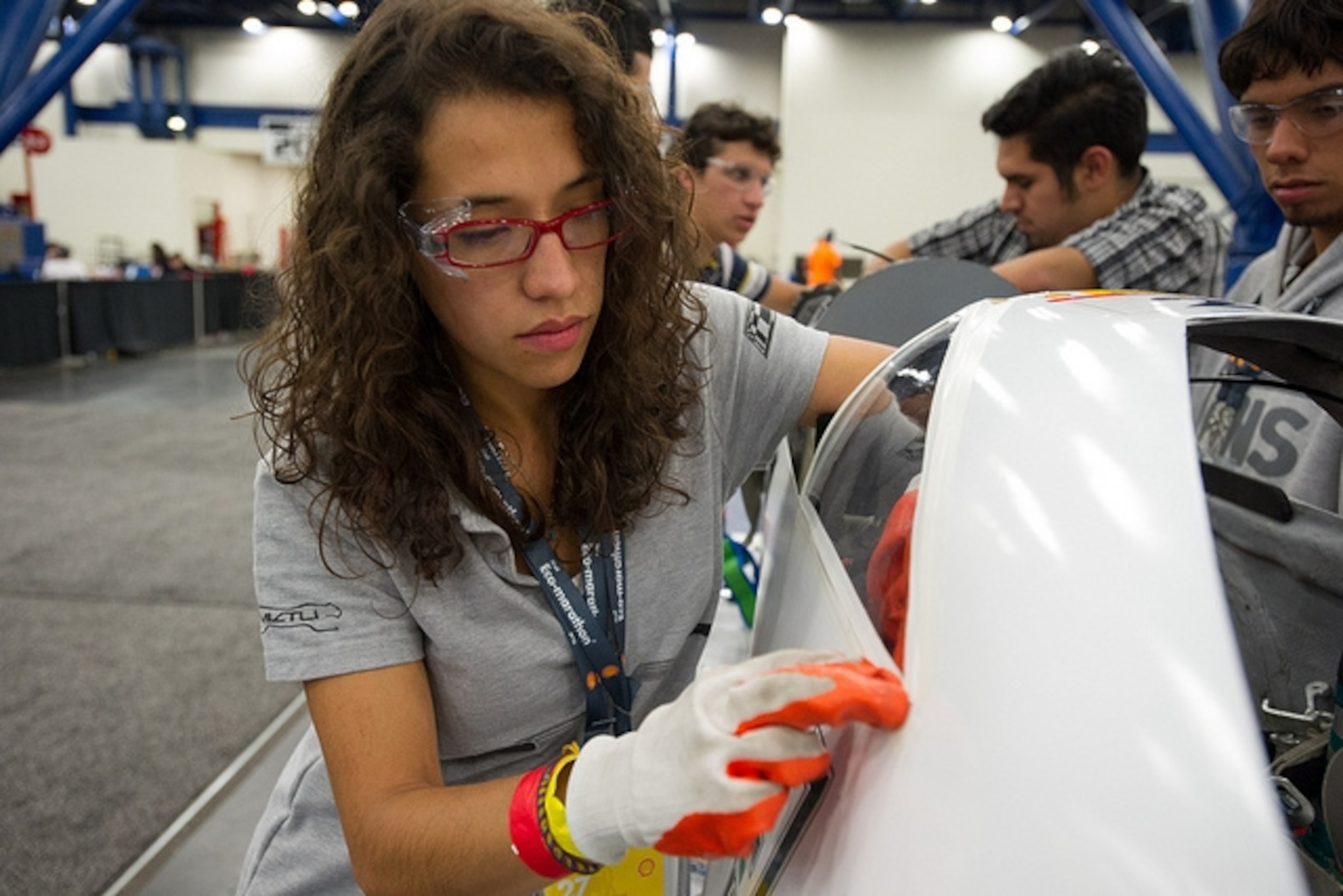 Pamela Ruiz works on Nacional Autonoma's shark-inspired car. Photo courtesey of Shell Eco-marathon
