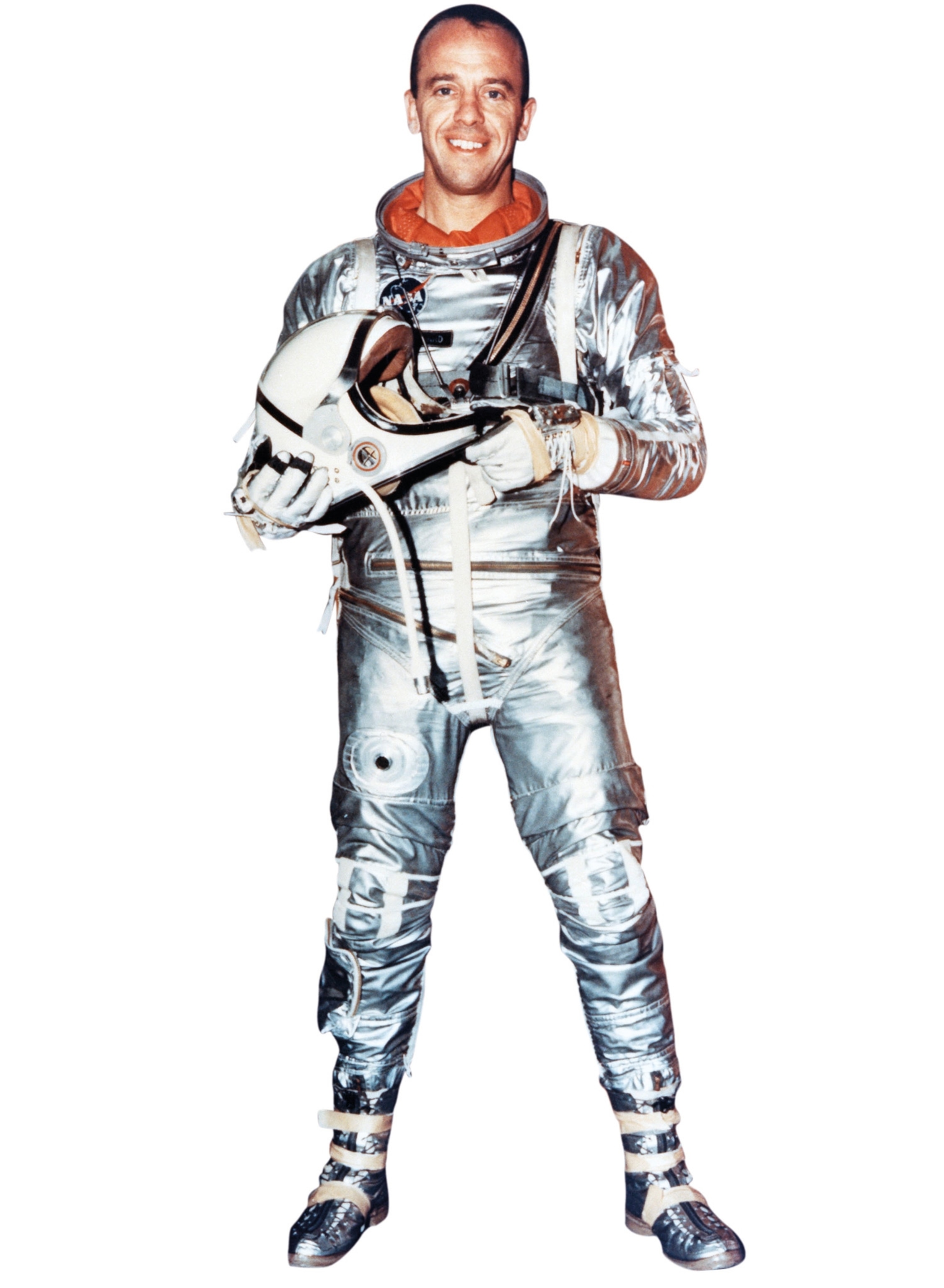 The astronaut poses for a photo in his Mercury pressure suit.