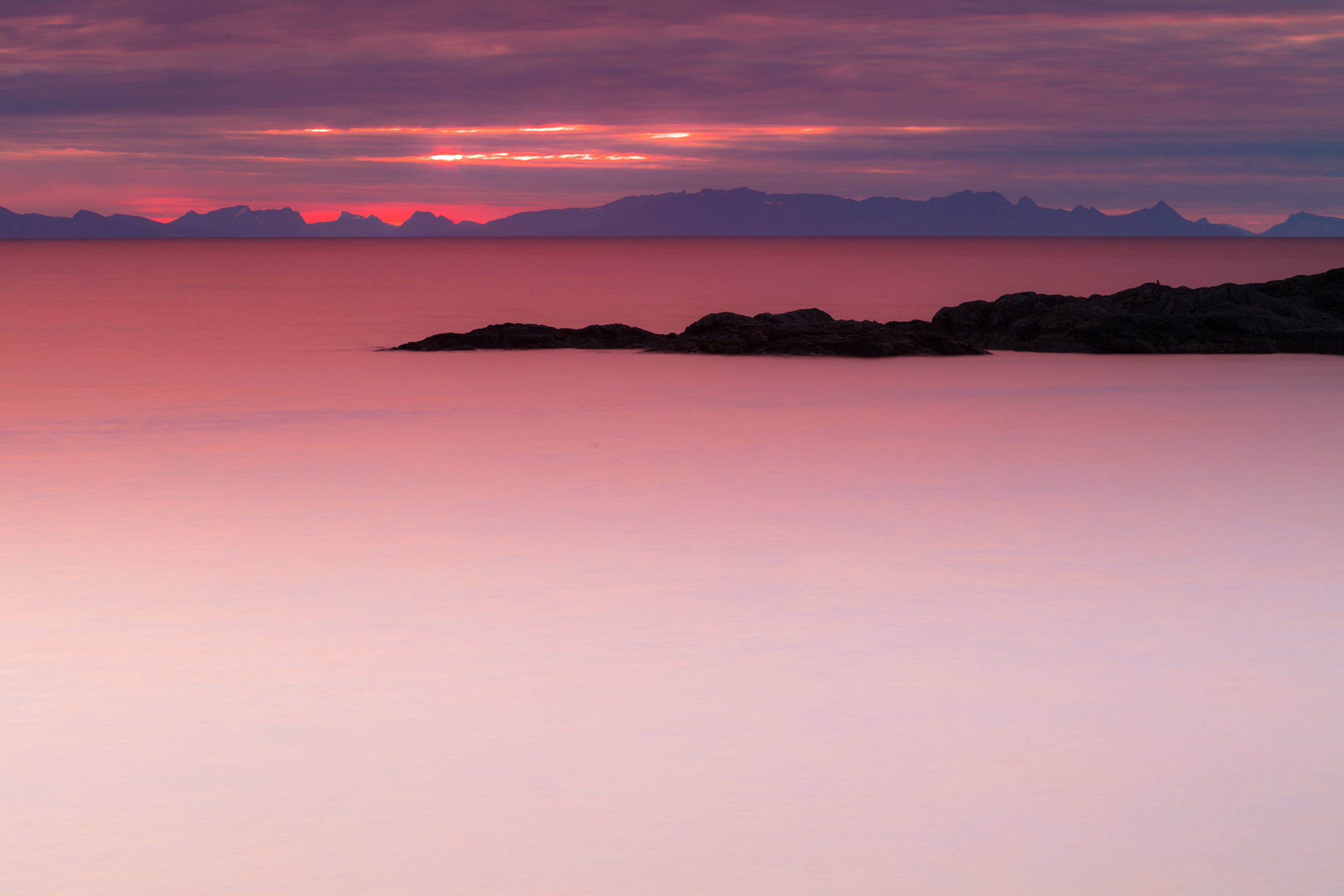 sunset over water in the Lofoten archipelago, Norway
