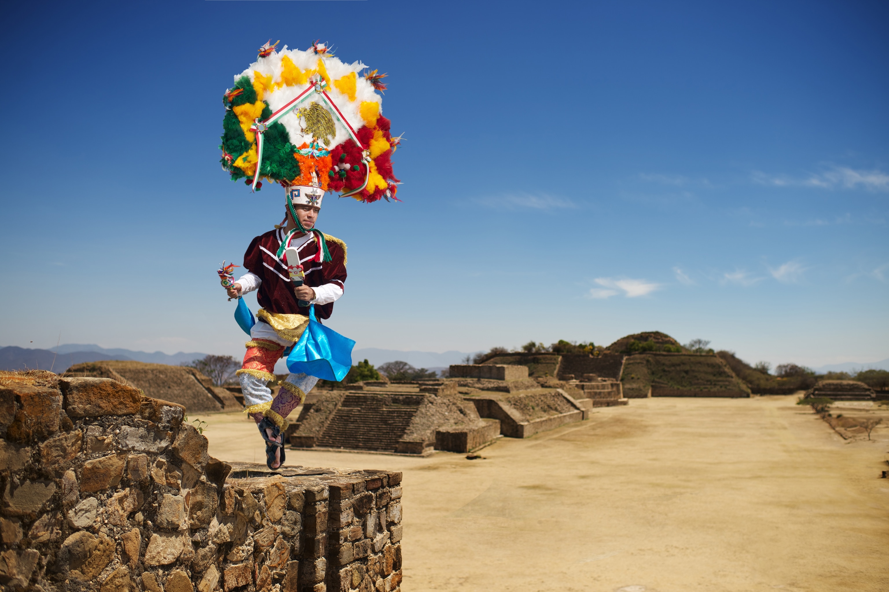 a dancer in the archaeological site of Monte Alban, Oaxaca, Mexico
