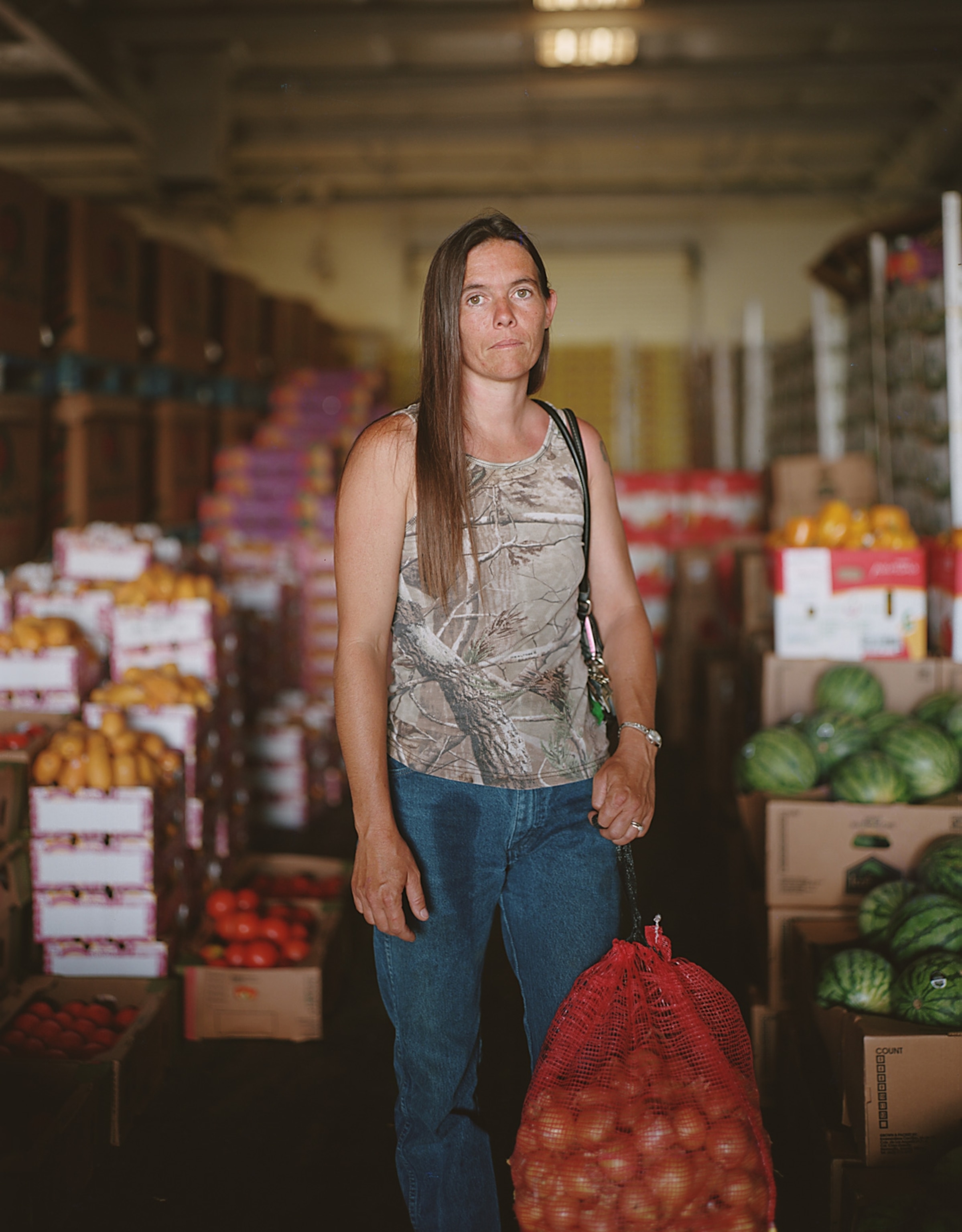 Melinda South picks up food from Borderlands Food Bank in Nogales, Arizona. Photograph by Bryan Schutmaat
