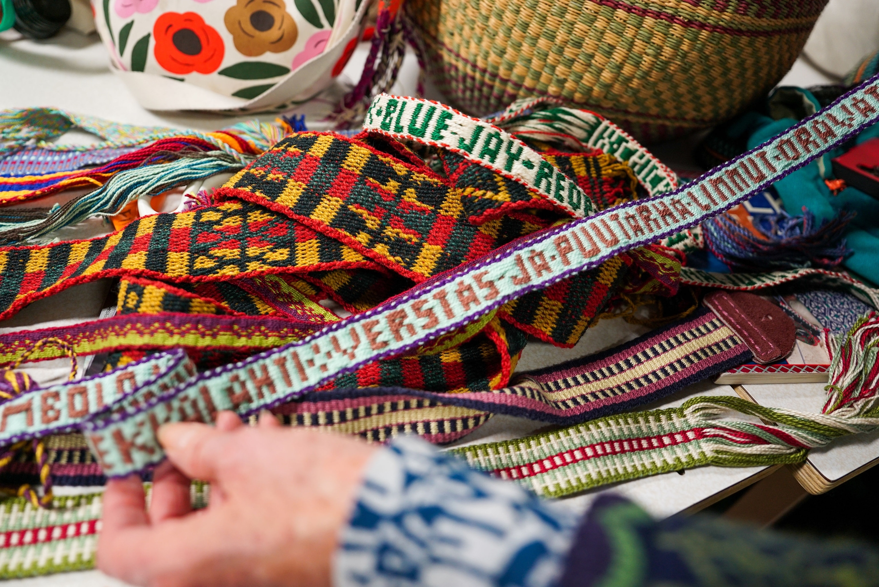 Samples of pick up weaving from an inkle band workshop at the Finnish American Folk School