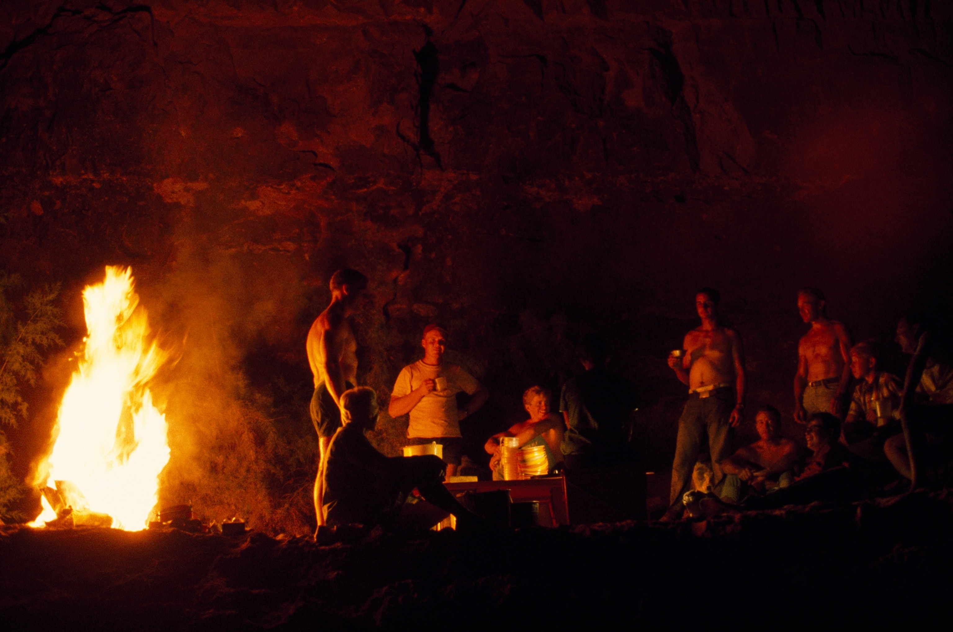 Tourists camp in Marble Canyon after a day of rafting.